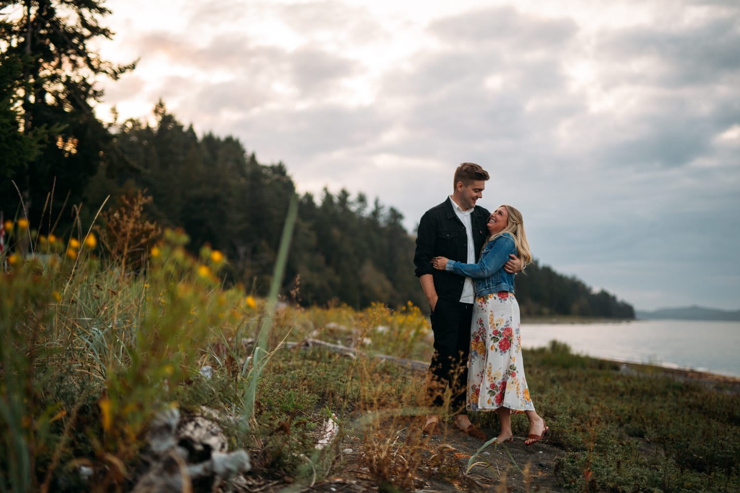 Mara and Casey weddings story frame 10: A Vancouver Island private-home wedding near Qualicum Beach, with Bowser prep, Friday gathering energy, custom vendors, kids, friends and cool Island air..