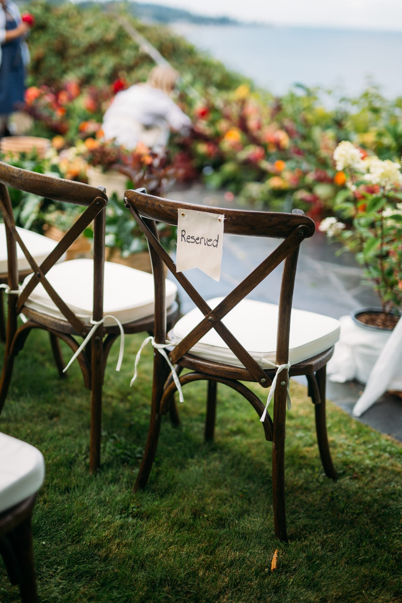 Mara and Casey weddings story frame 13: A Vancouver Island private-home wedding near Qualicum Beach, with Bowser prep, Friday gathering energy, custom vendors, kids, friends and cool Island air..