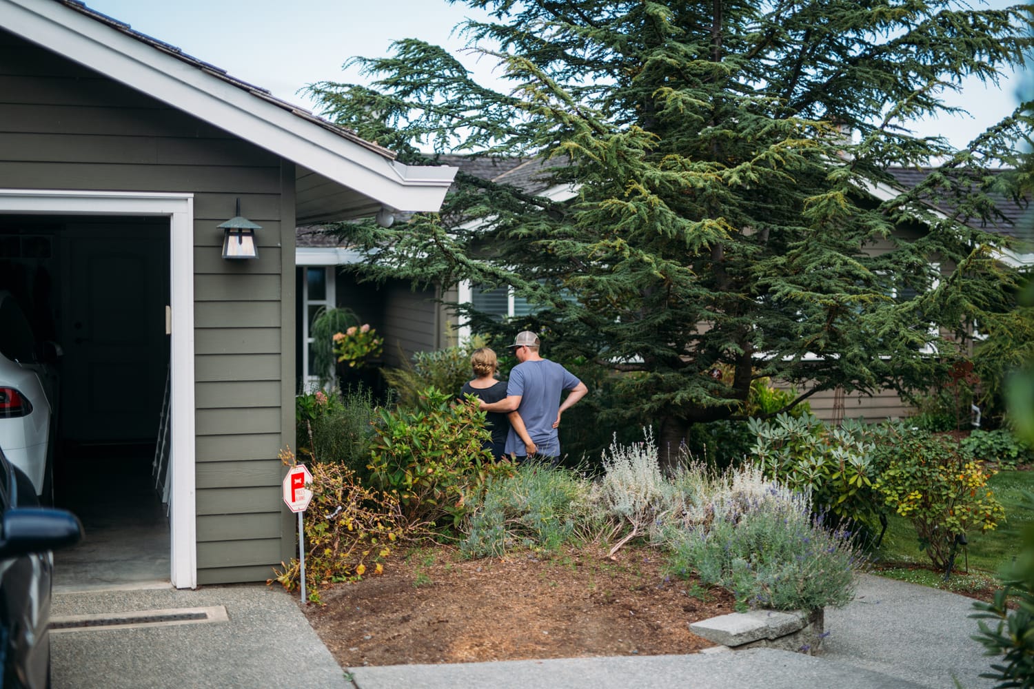 Mara and Casey weddings story frame 15: A Vancouver Island private-home wedding near Qualicum Beach, with Bowser prep, Friday gathering energy, custom vendors, kids, friends and cool Island air..