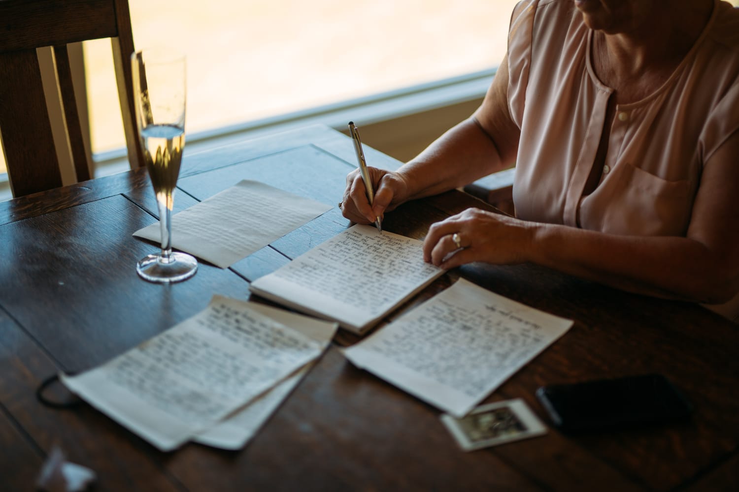 Mara and Casey weddings story frame 19: A Vancouver Island private-home wedding near Qualicum Beach, with Bowser prep, Friday gathering energy, custom vendors, kids, friends and cool Island air..