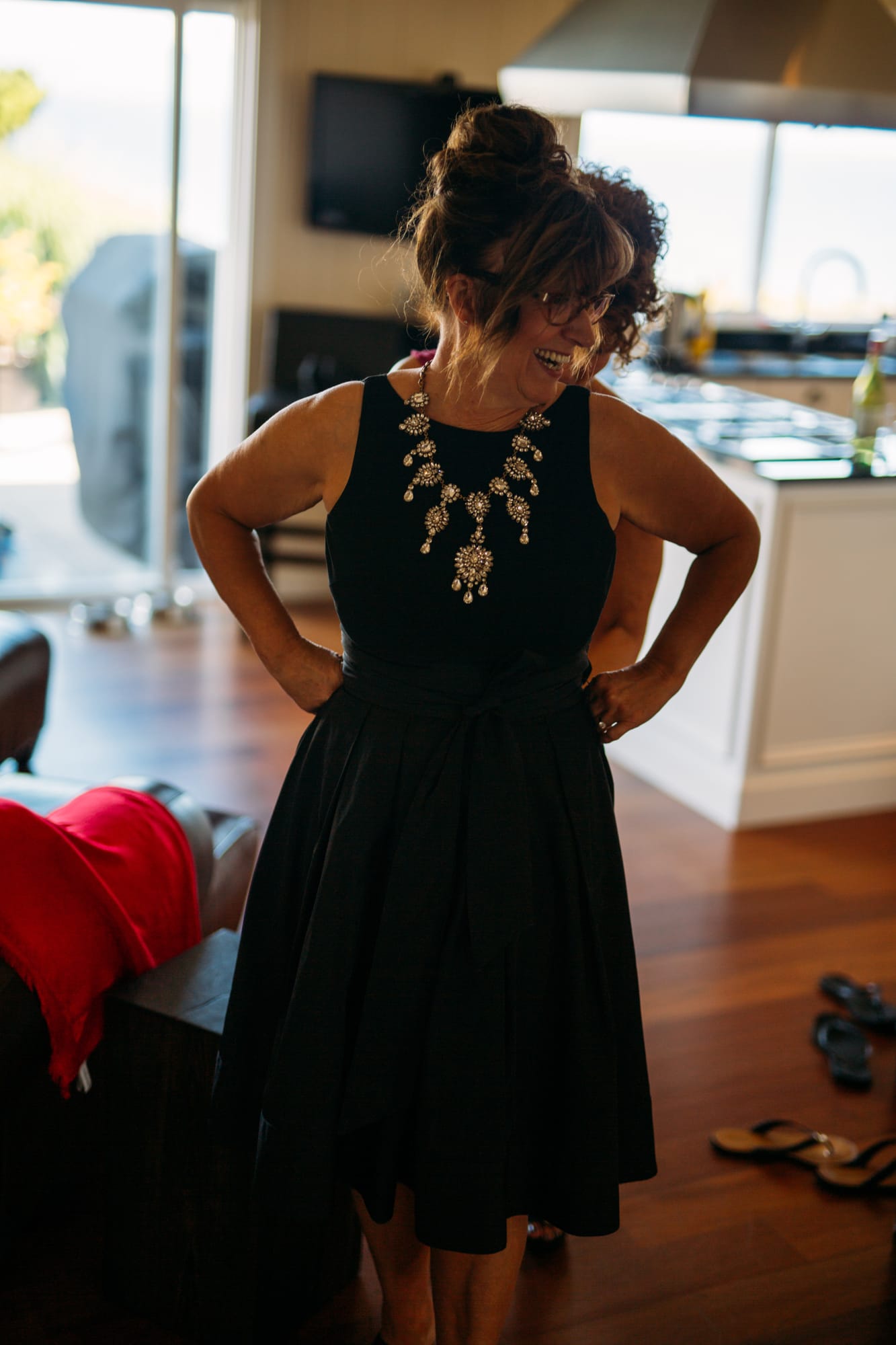 Mara and Casey weddings story frame 21: A Vancouver Island private-home wedding near Qualicum Beach, with Bowser prep, Friday gathering energy, custom vendors, kids, friends and cool Island air..