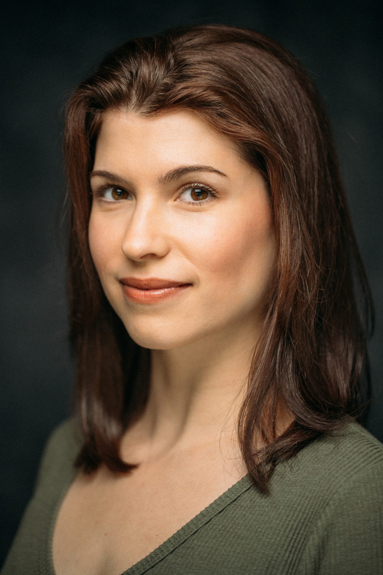 Marie headshot with actor-friendly expression and profile use