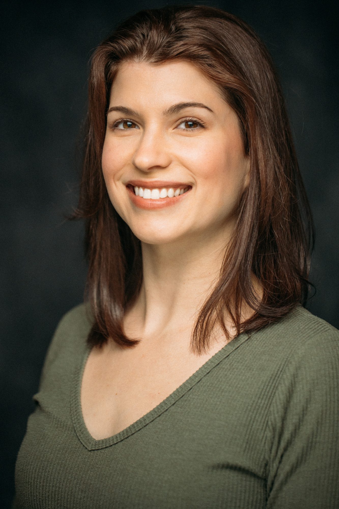 Marie headshot portrait with direct expression