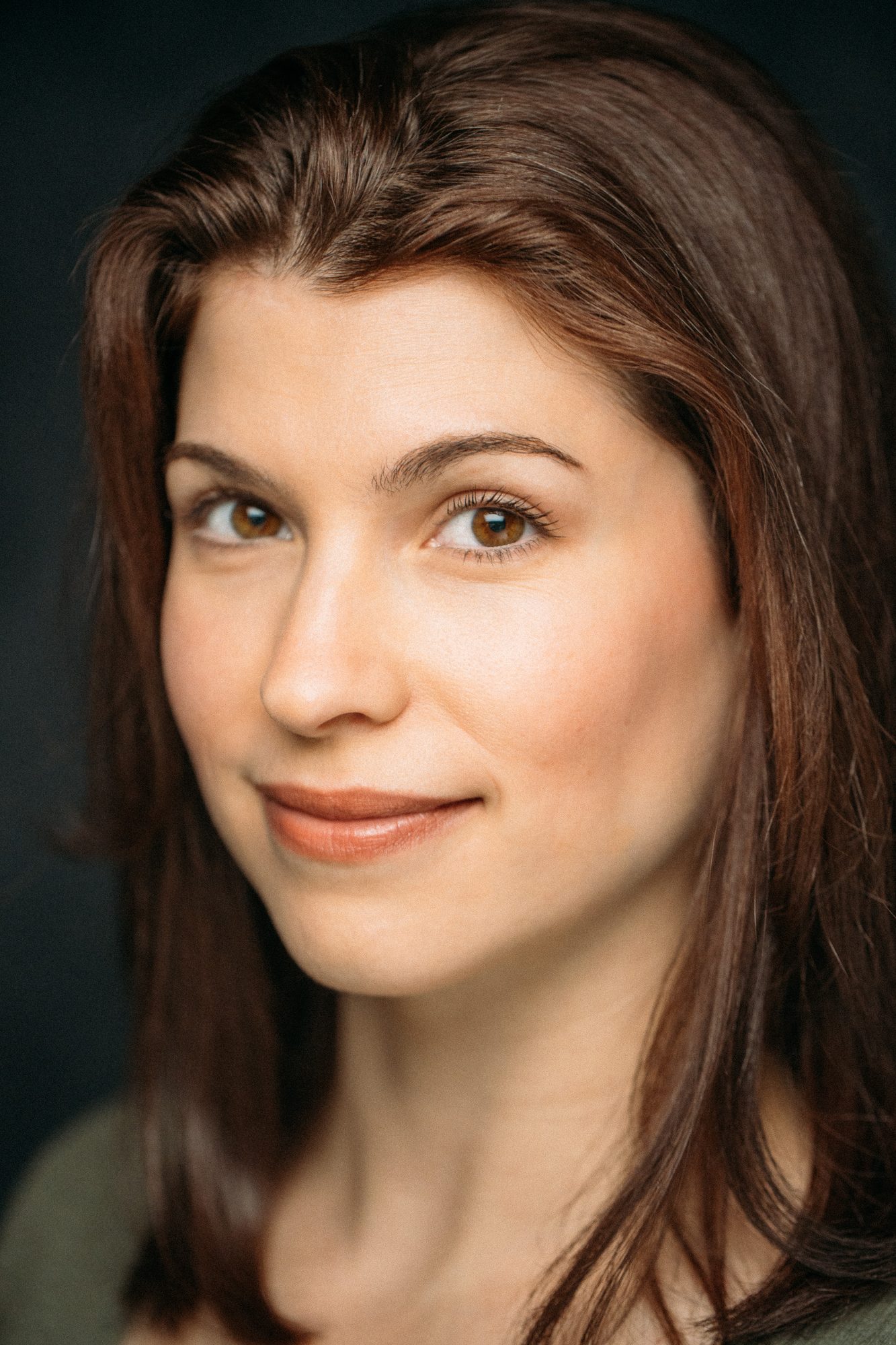 Marie headshot portrait with direct expression
