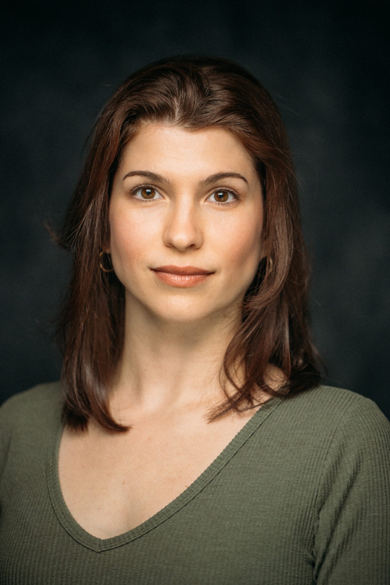 Marie headshot portrait with direct expression