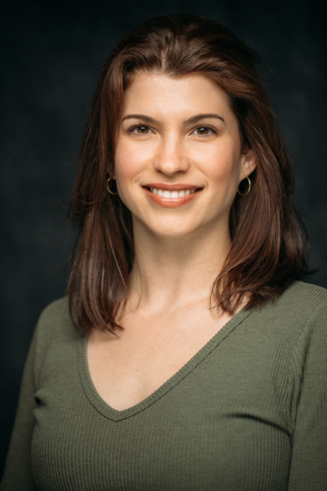 Marie headshot portrait with direct expression