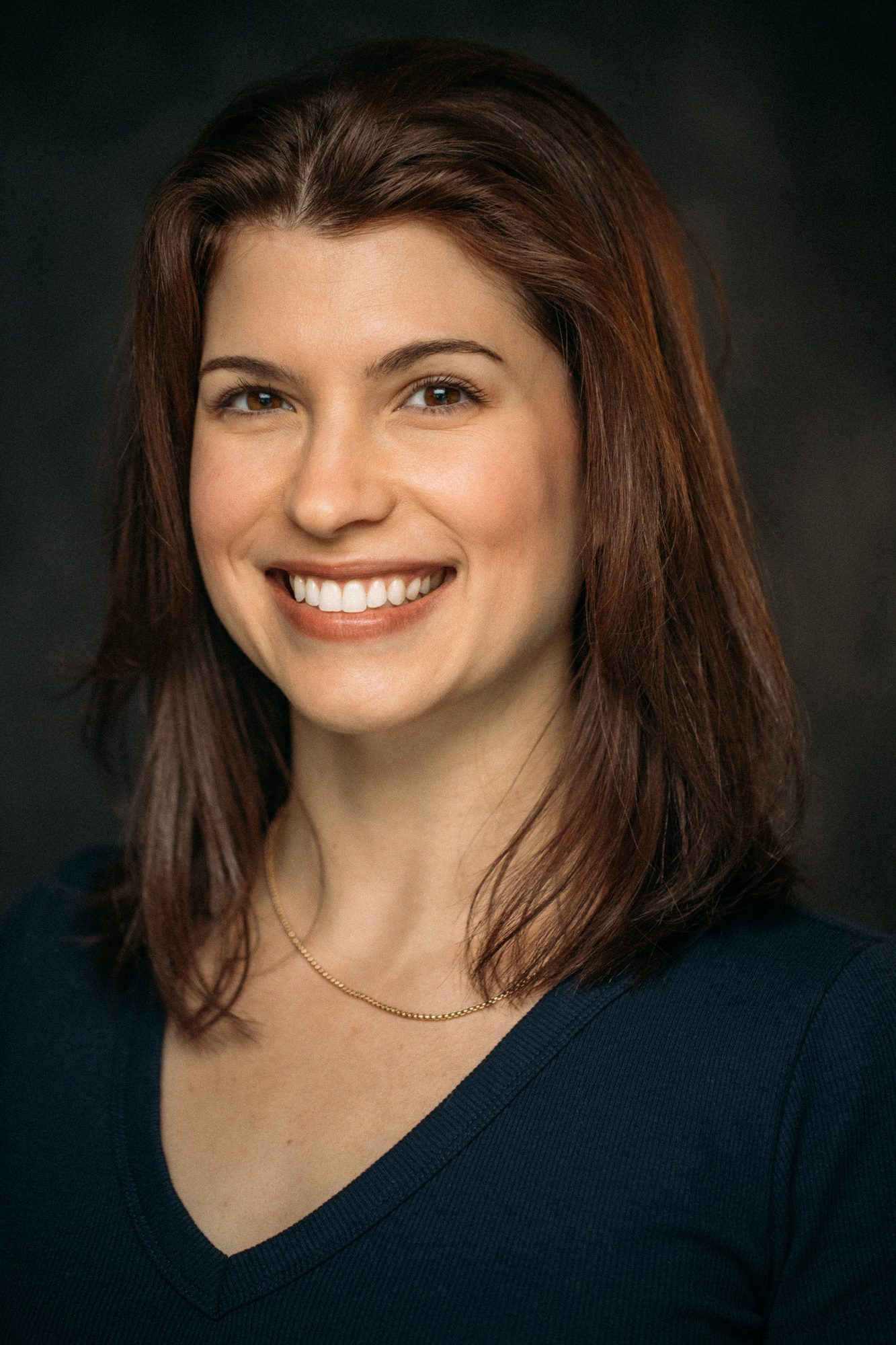 Marie headshot portrait with direct expression