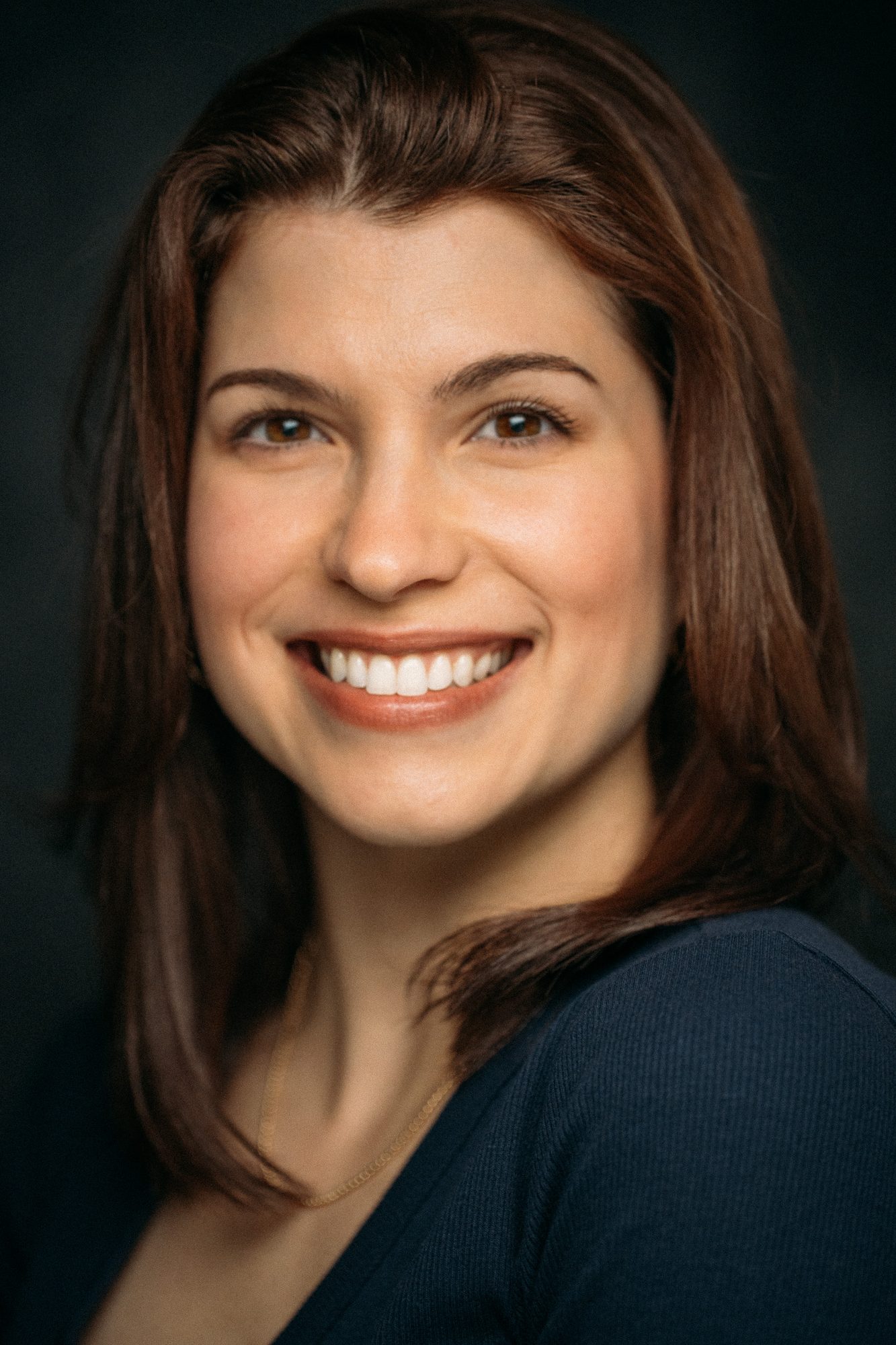 Marie headshot portrait with direct expression
