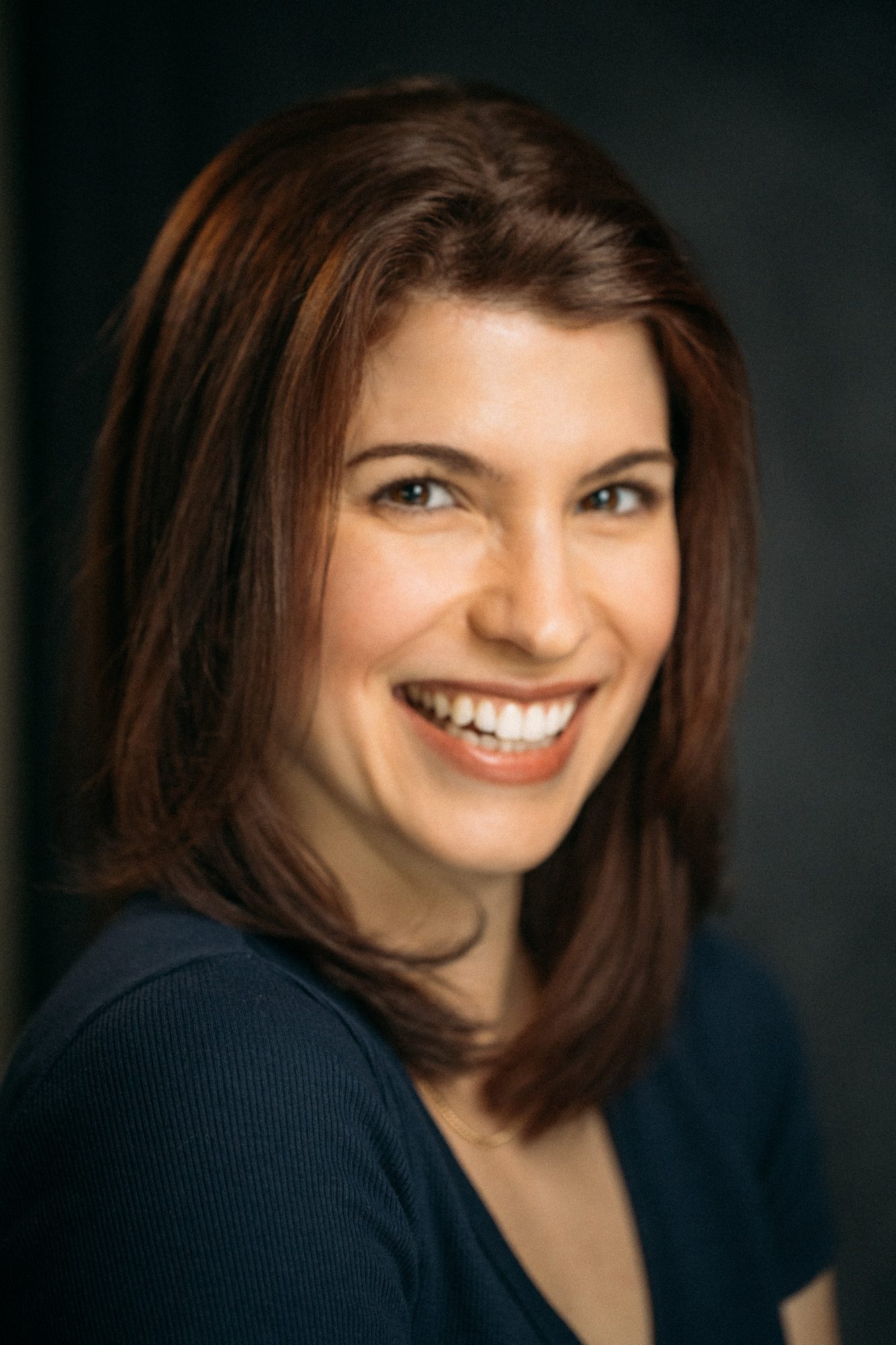 Marie headshot portrait with direct expression