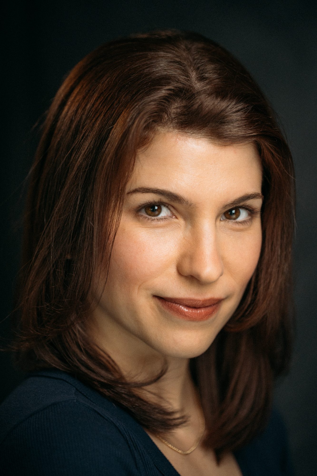 Marie headshot portrait with direct expression