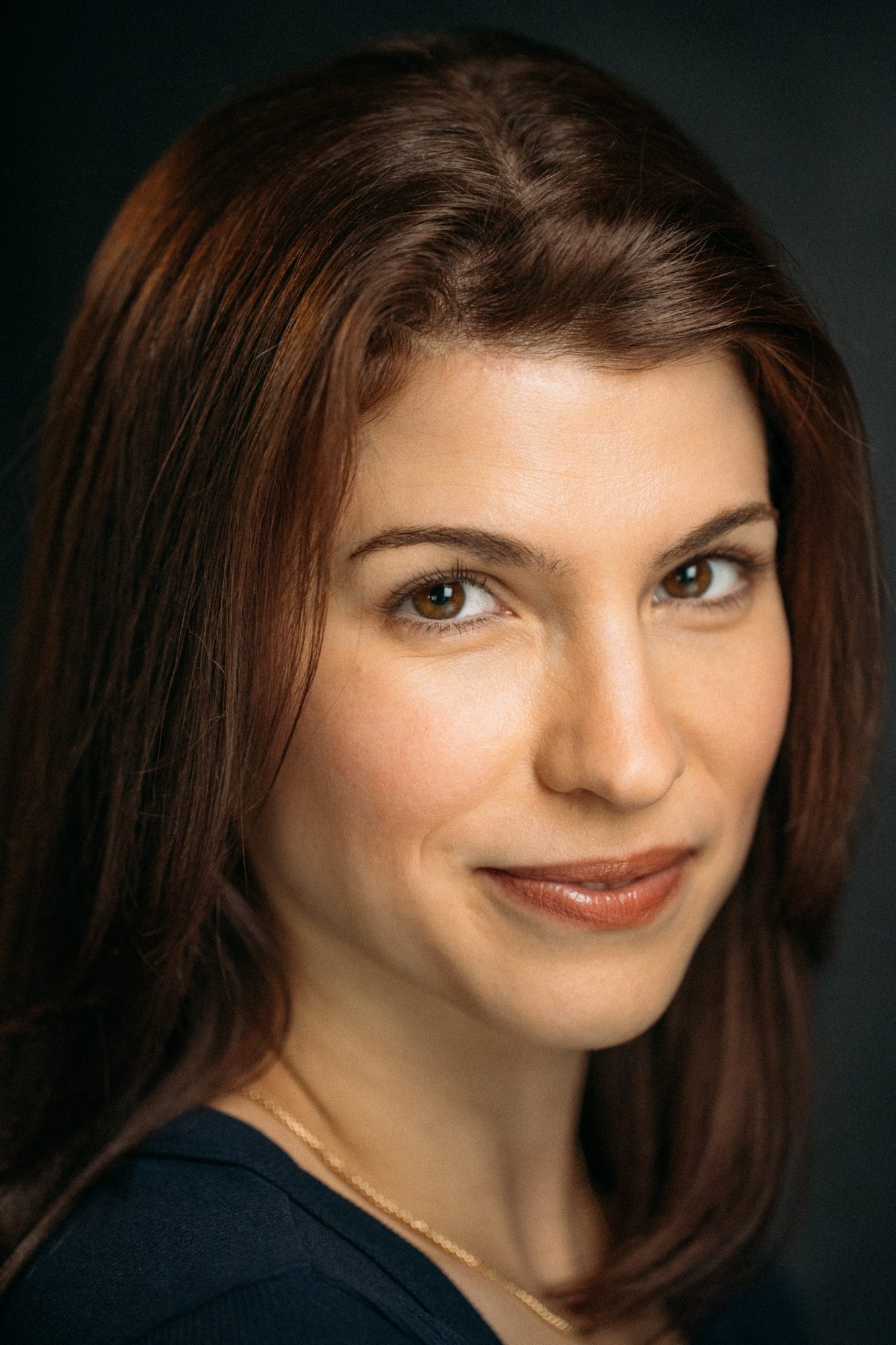 Marie headshot portrait with direct expression