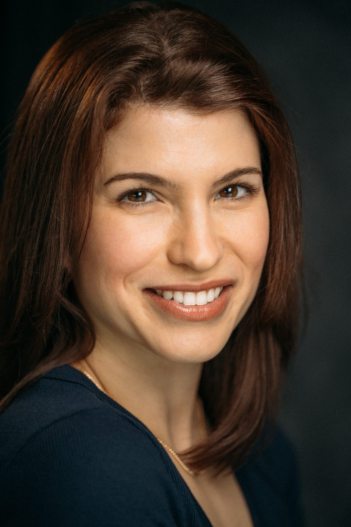 Marie headshot portrait with direct expression