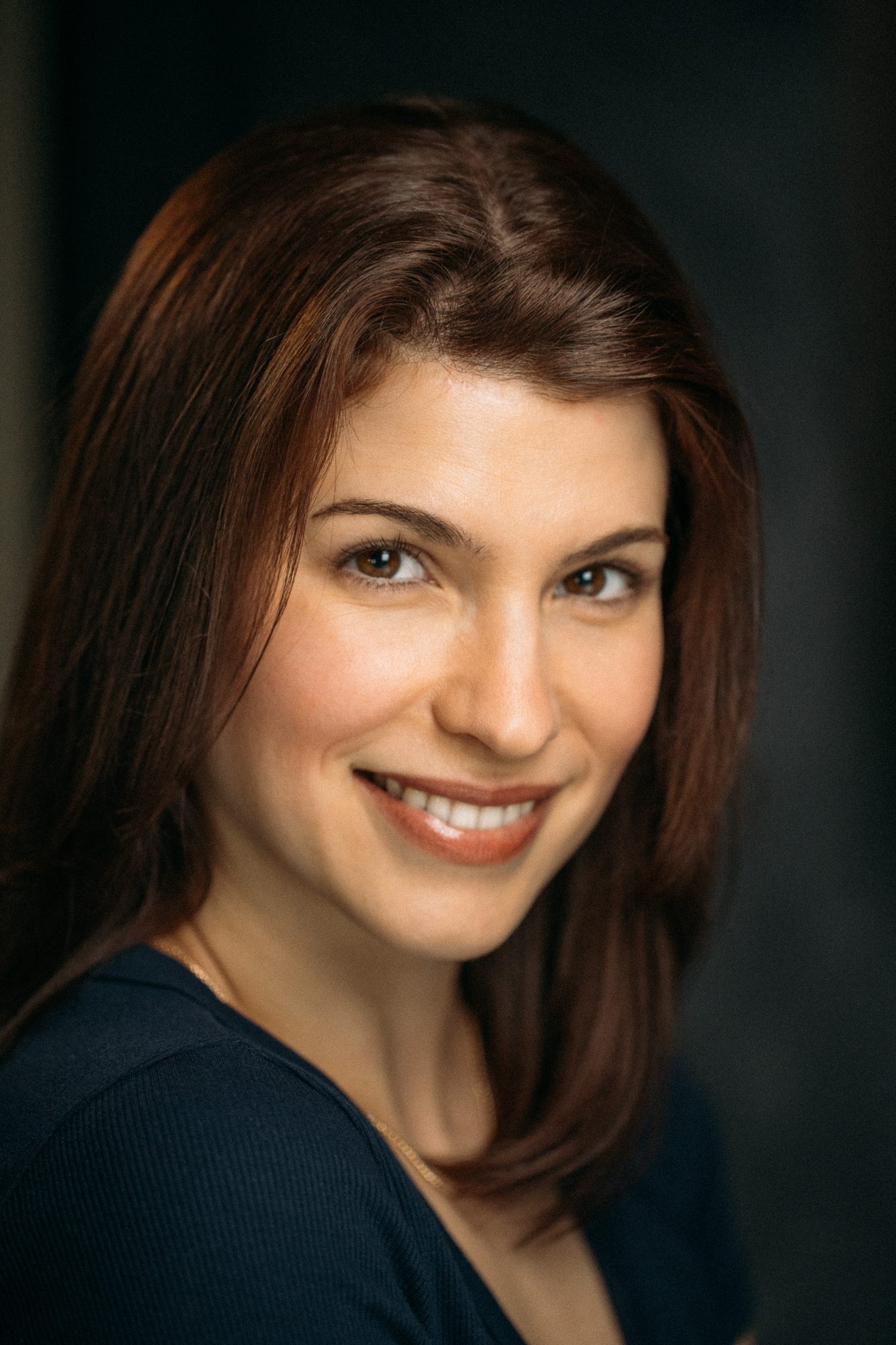 Marie headshot portrait with direct expression