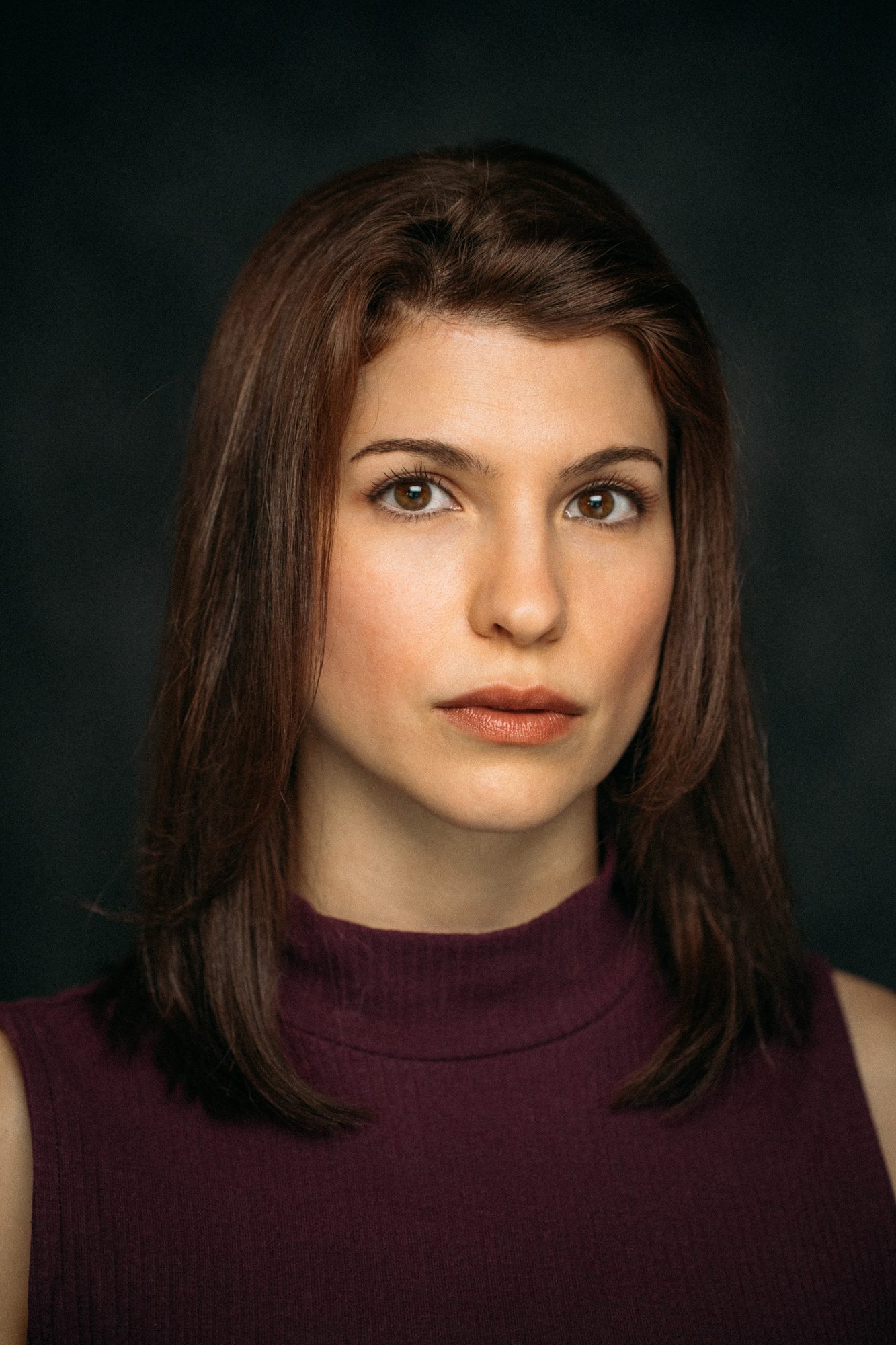 Marie headshot portrait with direct expression