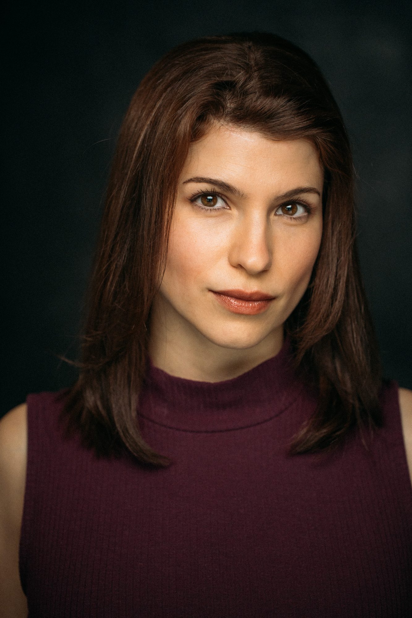 Marie headshot portrait with direct expression