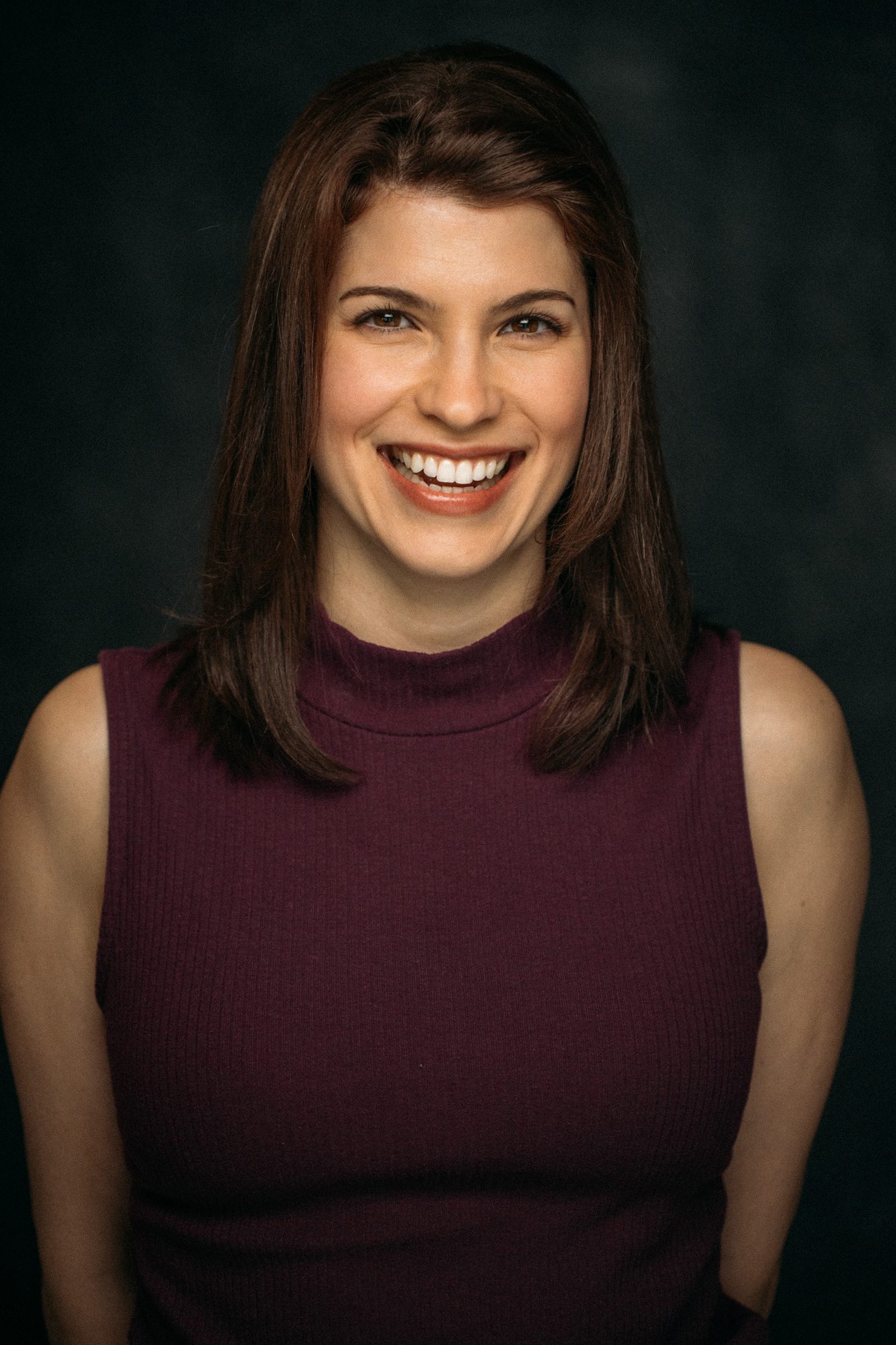 Marie headshot portrait with direct expression
