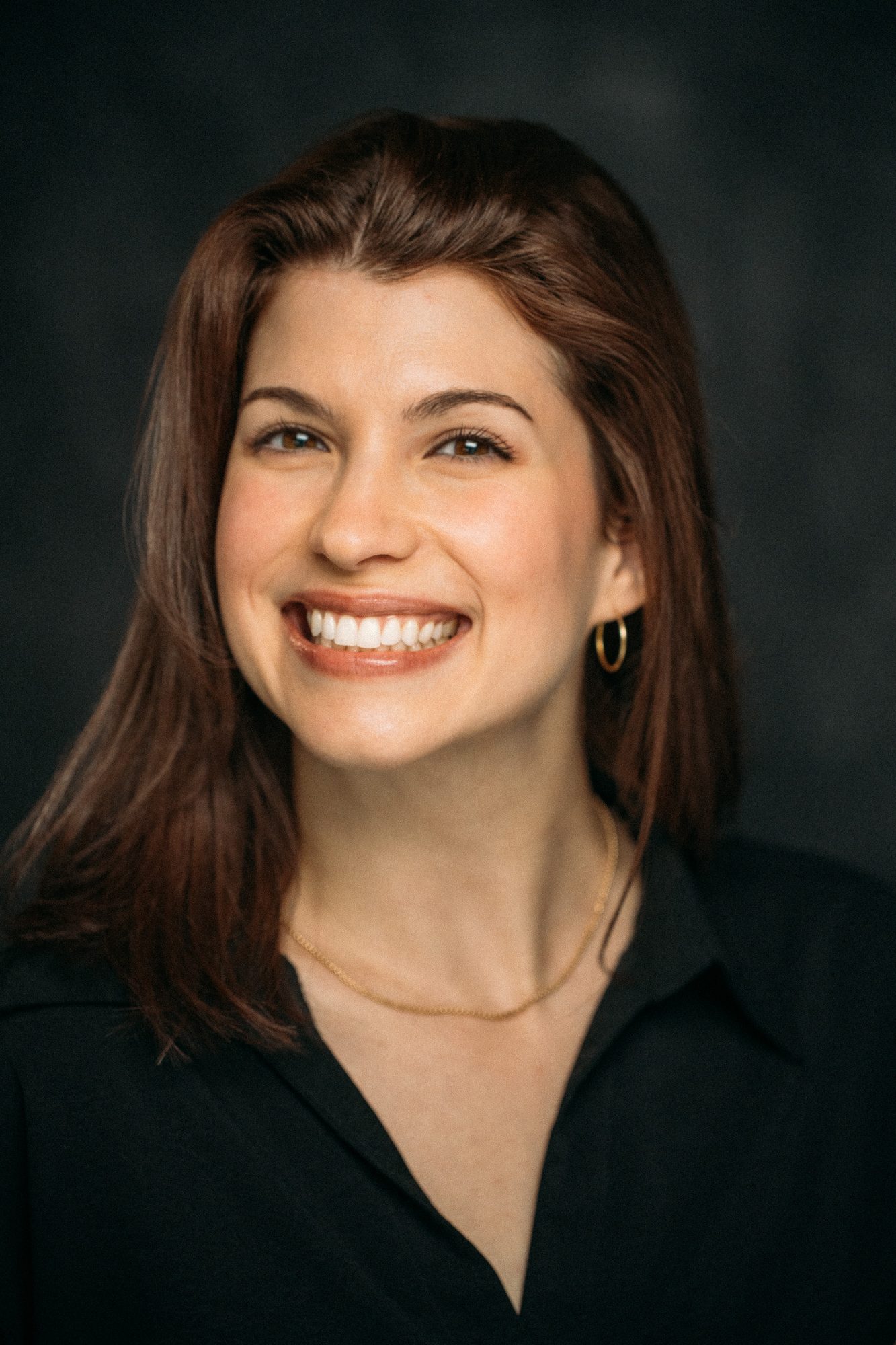 Marie headshot portrait with direct expression