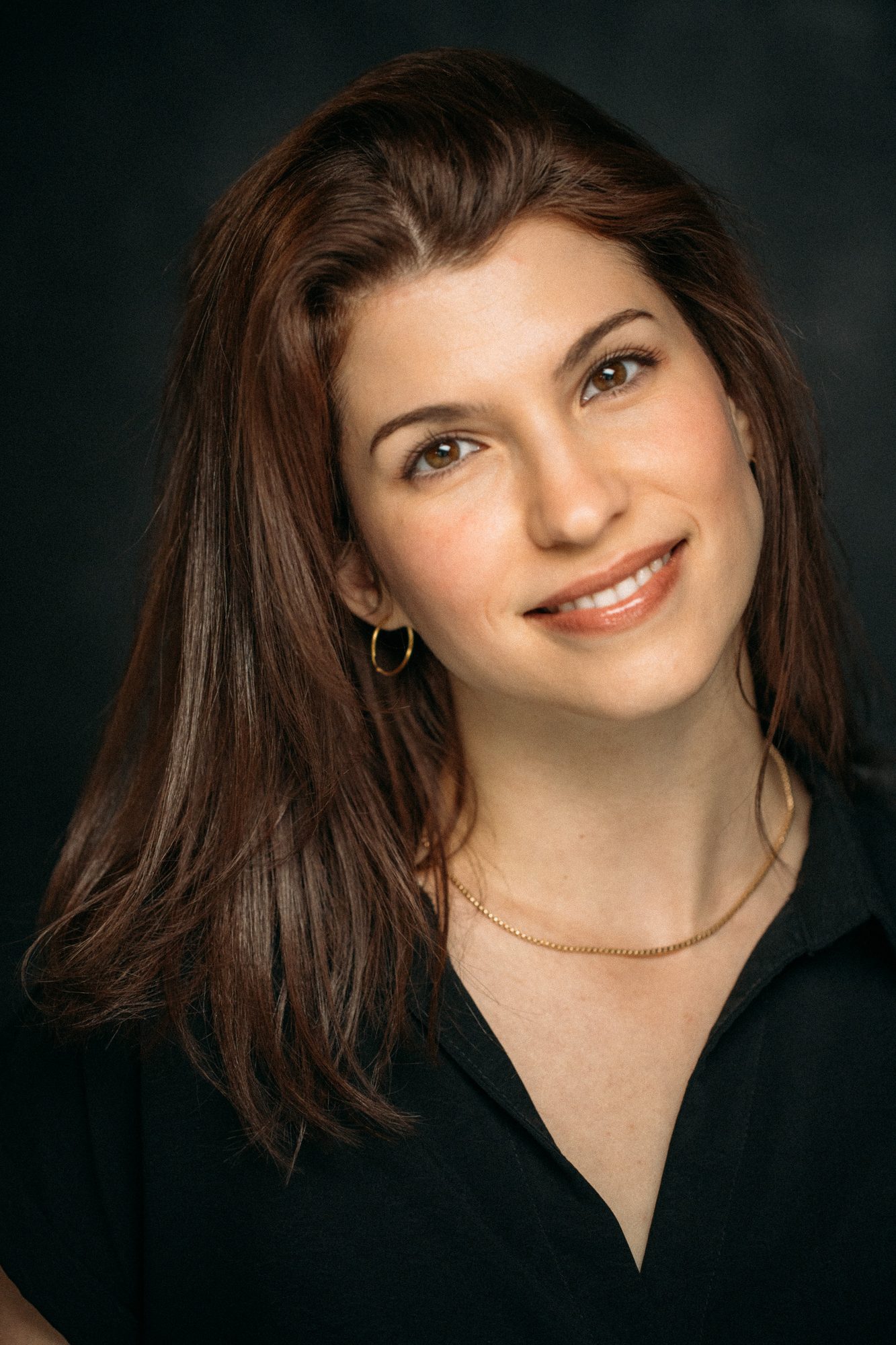 Marie headshot portrait with direct expression
