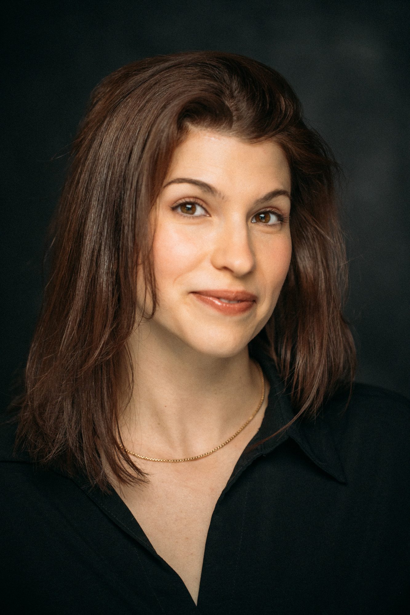 Marie headshot portrait with direct expression