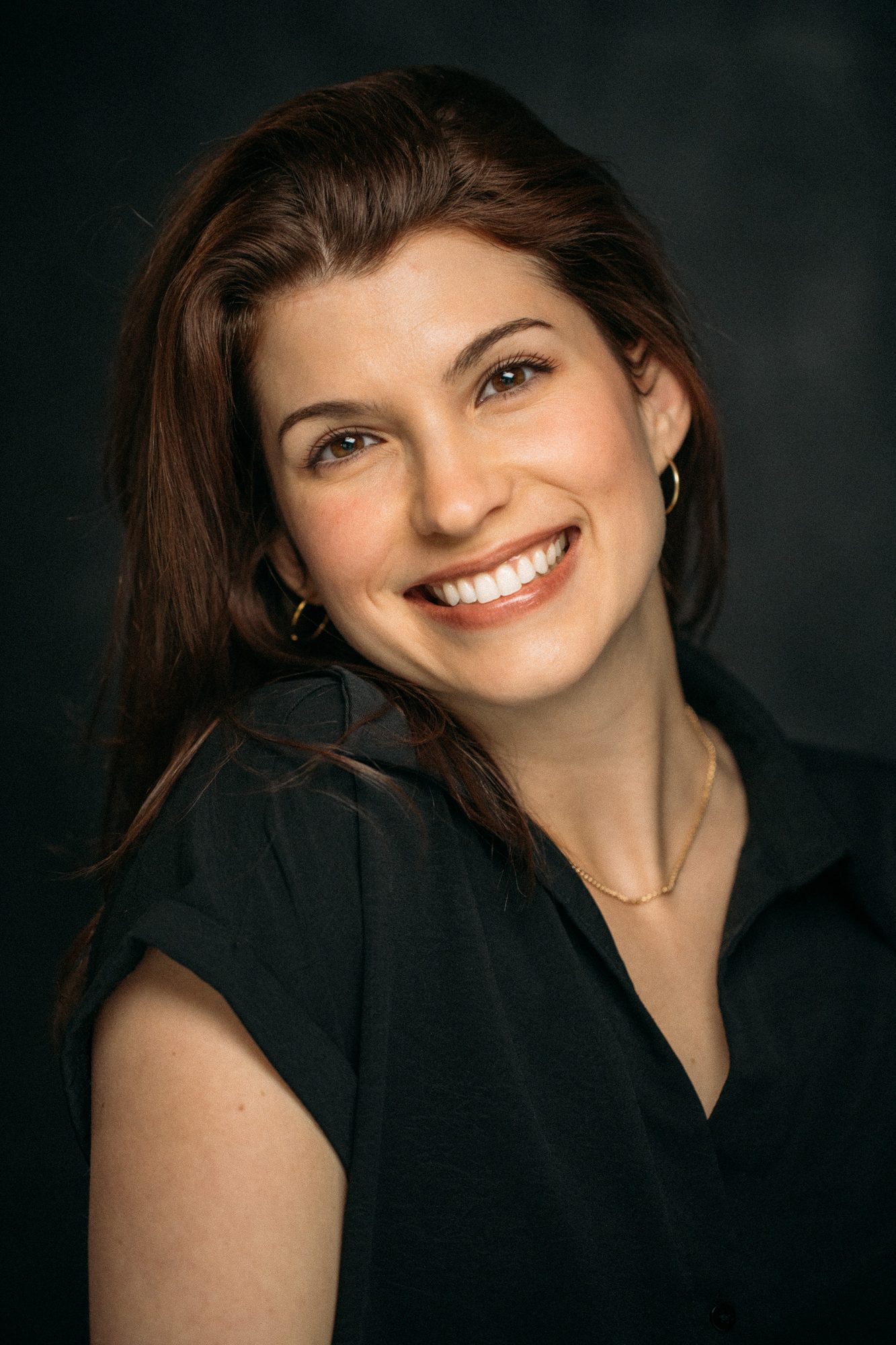 Marie headshot portrait with direct expression