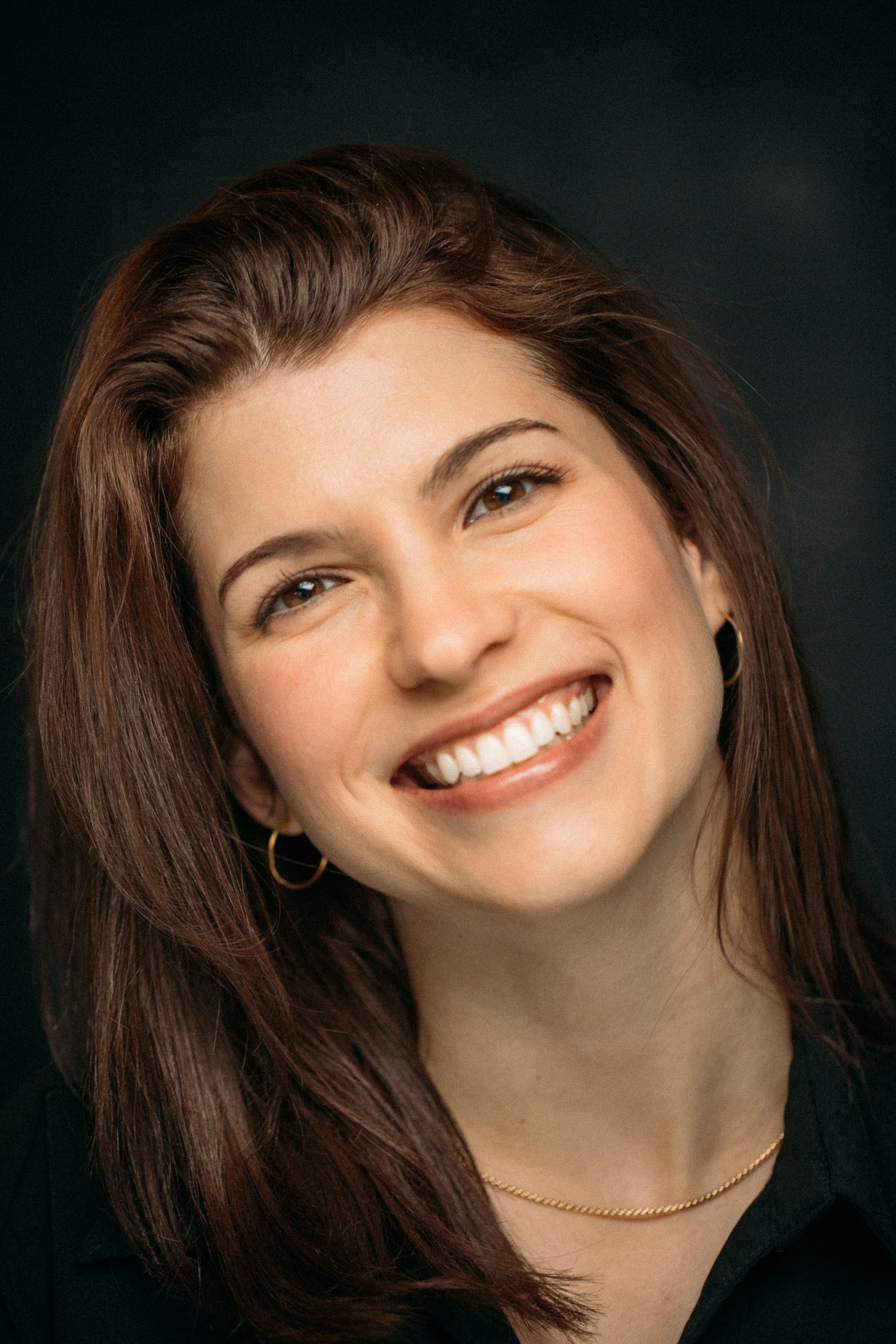 Marie headshot portrait with direct expression
