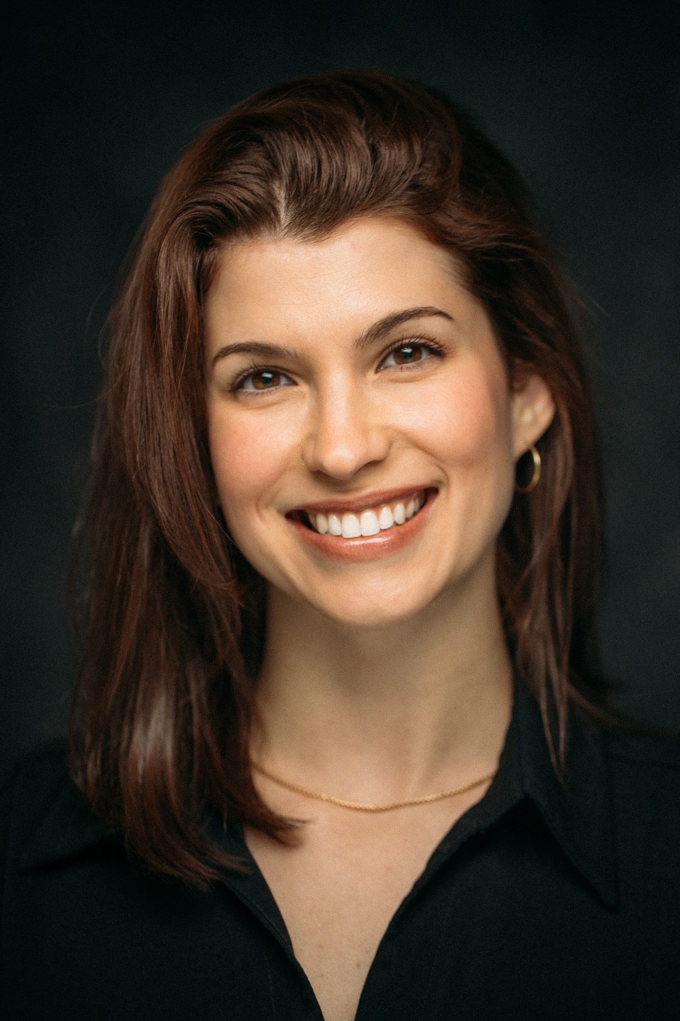 Marie headshot portrait with direct expression