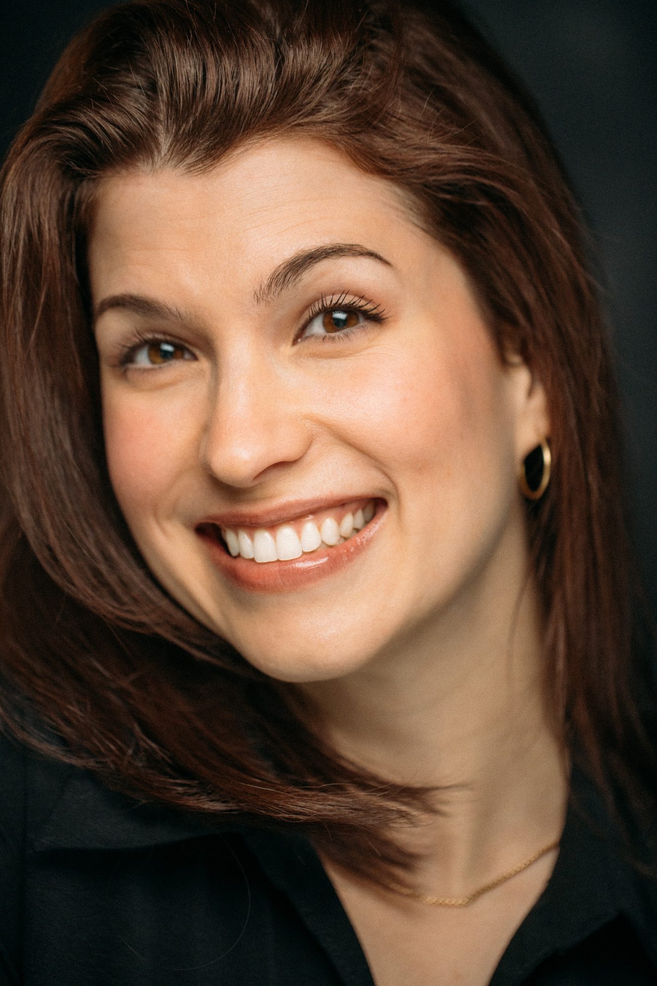 Marie headshot portrait with direct expression