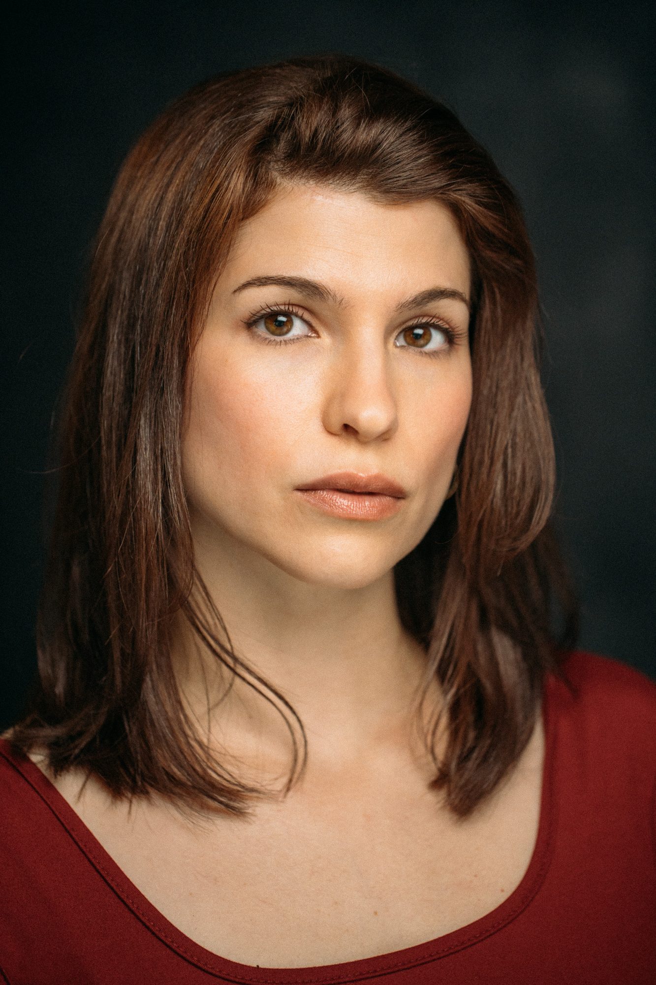 Marie headshot portrait with direct expression