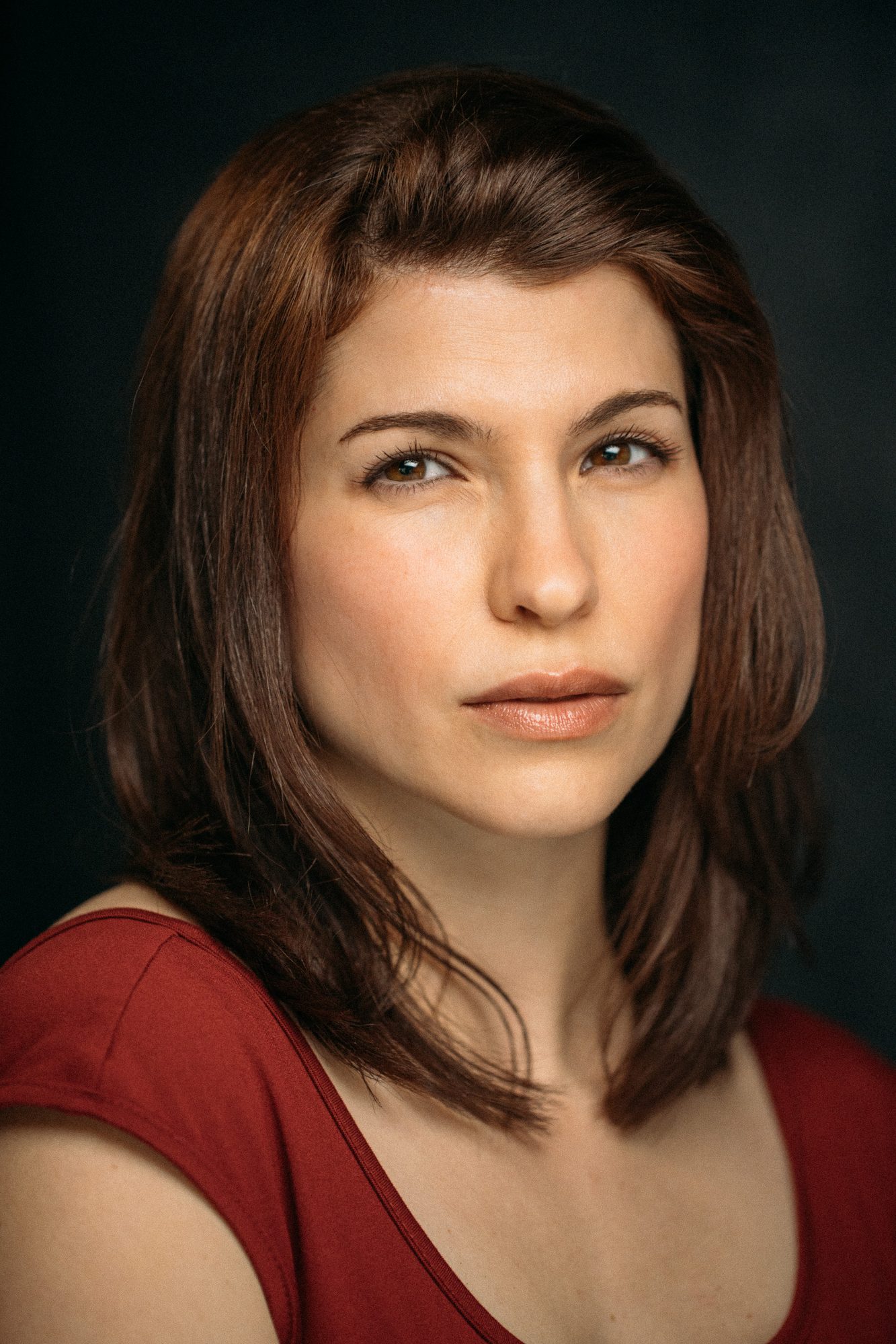 Marie headshot portrait with direct expression