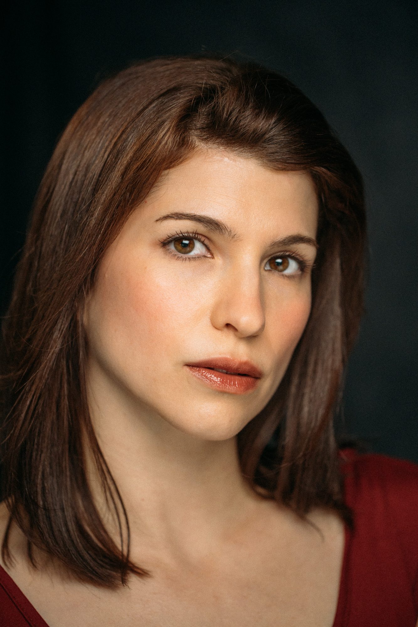 Marie headshot portrait with direct expression