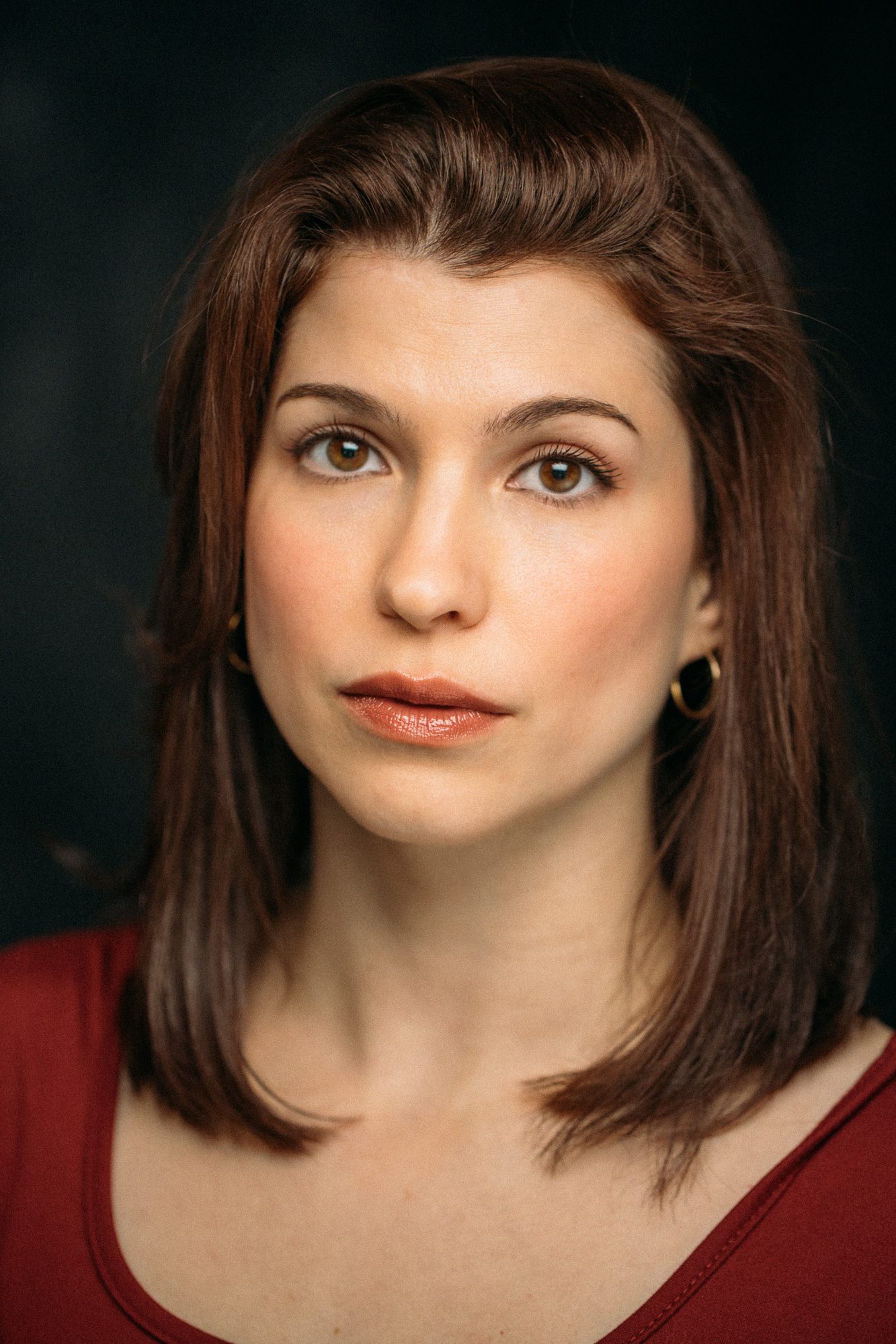 Marie headshot portrait with direct expression