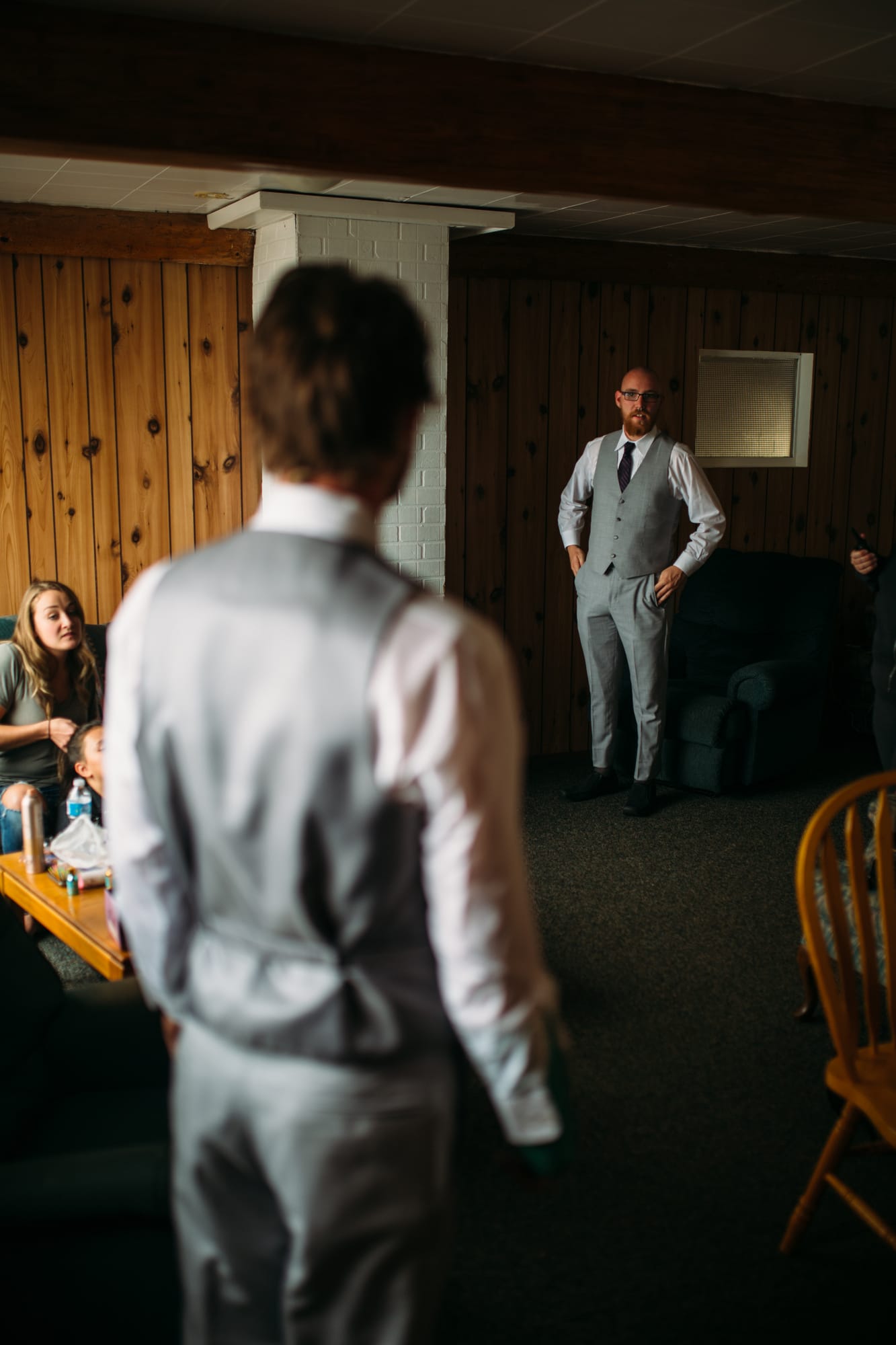 Marie and Mark weddings story frame 5: A Mabel Lake Airpark wedding in the North Okanagan, with grass-runway scenery, open-air photos and sweet family help around makeup, flowers and petals..
