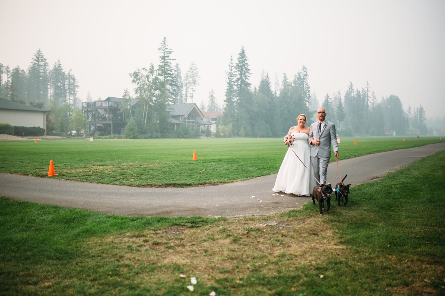 Marie and Mark weddings story frame 17: A Mabel Lake Airpark wedding in the North Okanagan, with grass-runway scenery, open-air photos and sweet family help around makeup, flowers and petals..