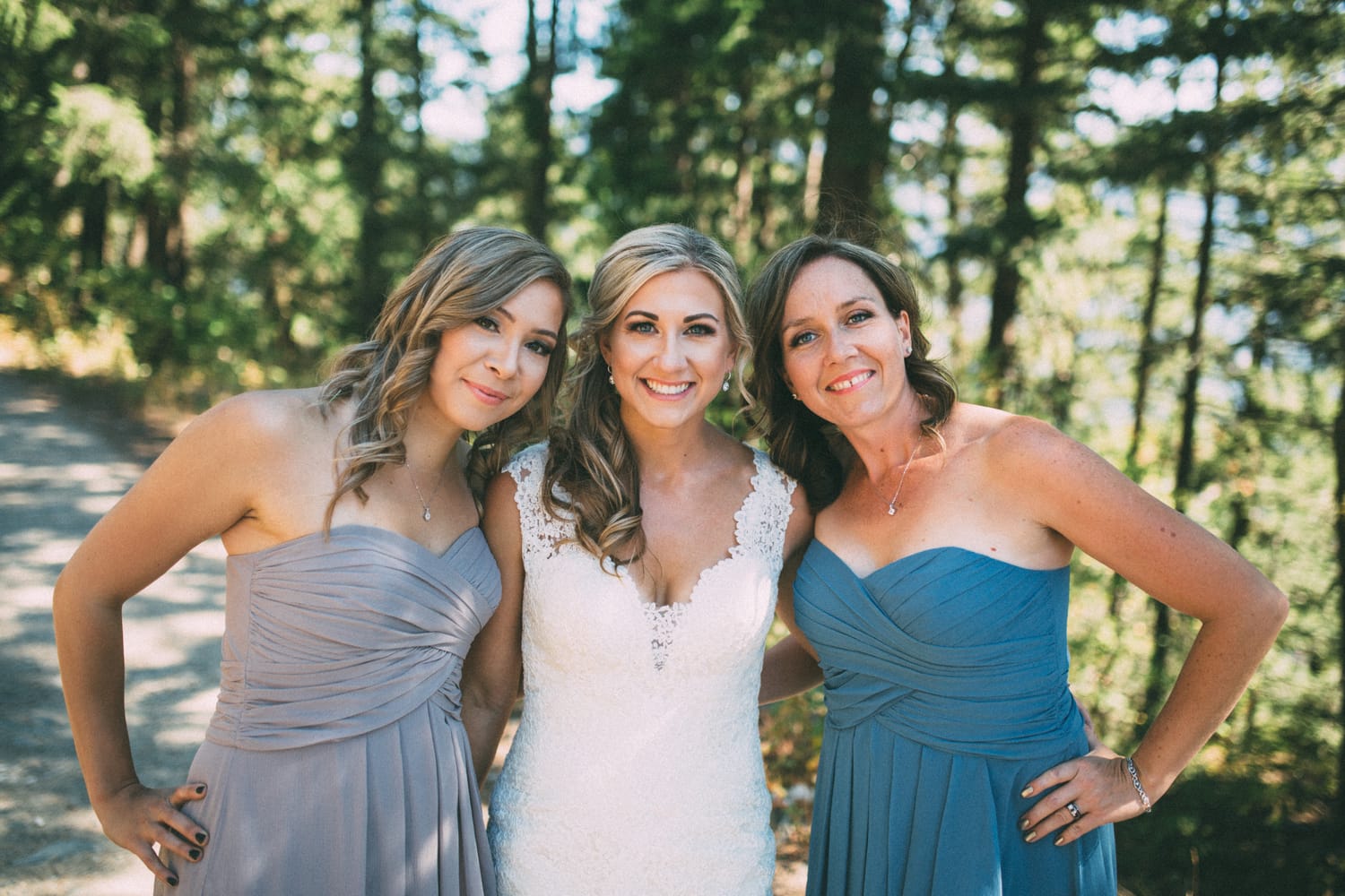 Megan and Jarid weddings story frame 17: A Shuswap-area wedding around Sicamous, Swansea Point and Hyde Mountain, with boat/lake context, cliff portraits and strong floral colour..