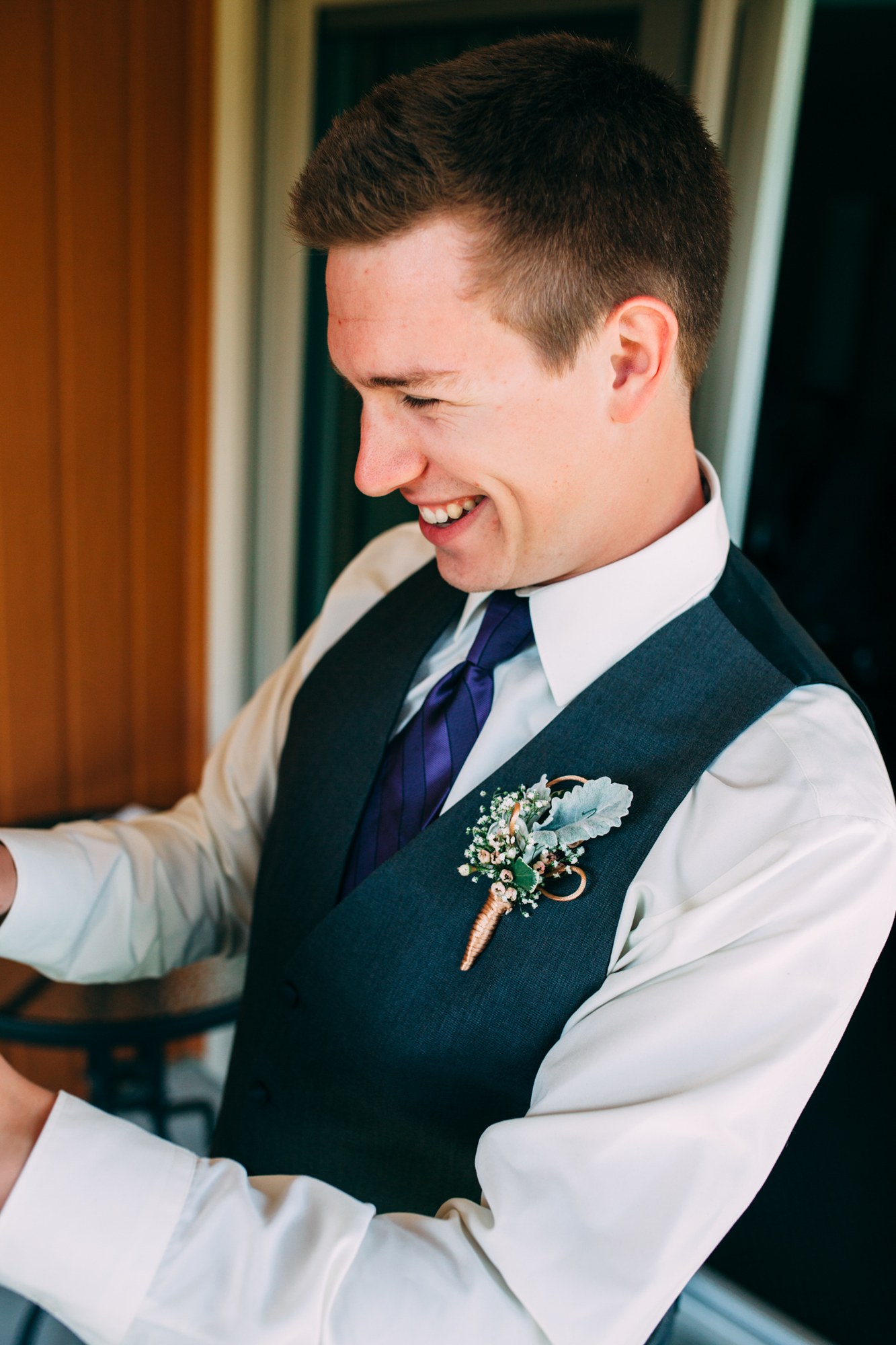 Mel & Eric: A warm candid smile from the groom.