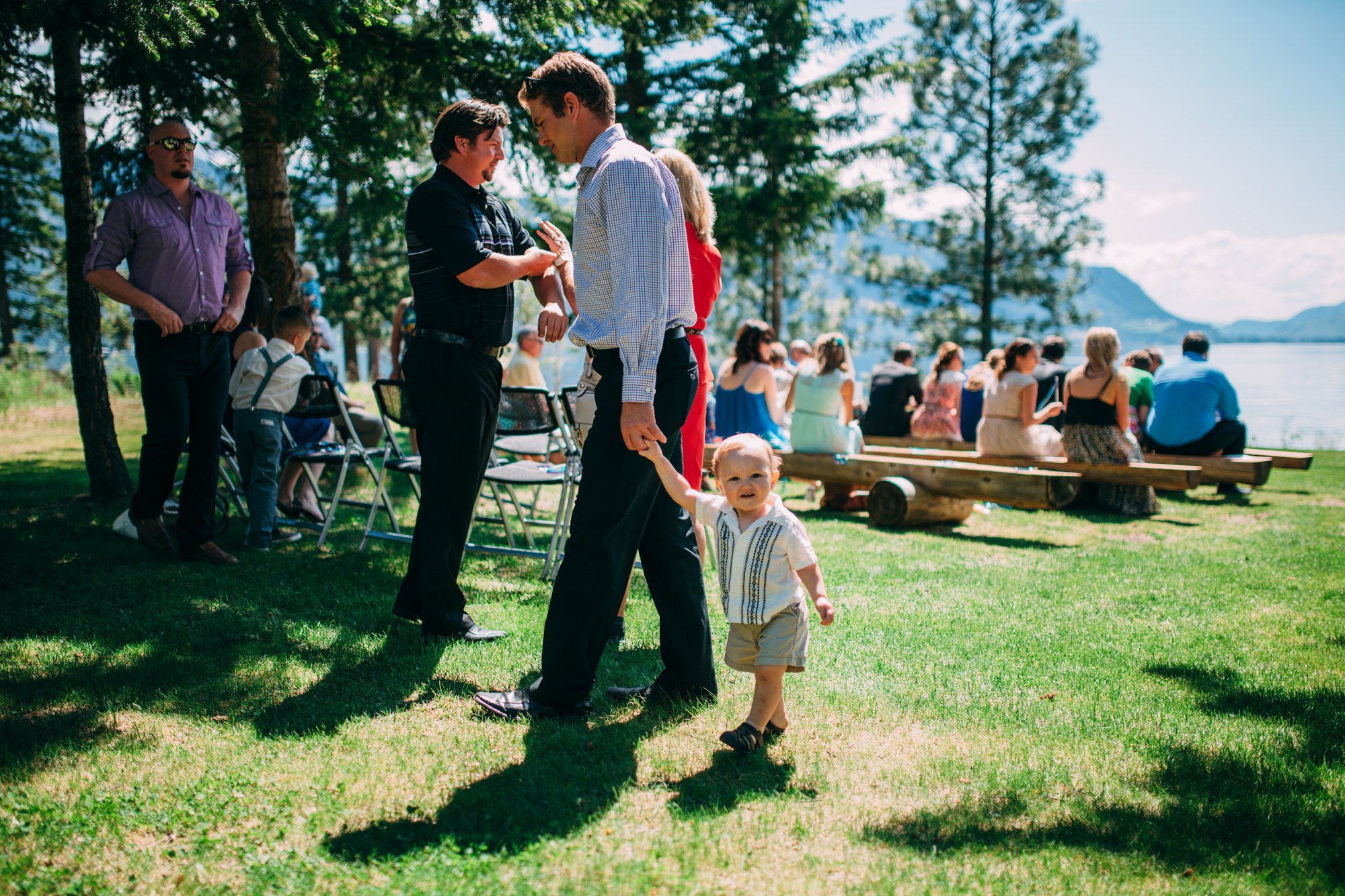 Mel & Eric: A guest walking with a young child.