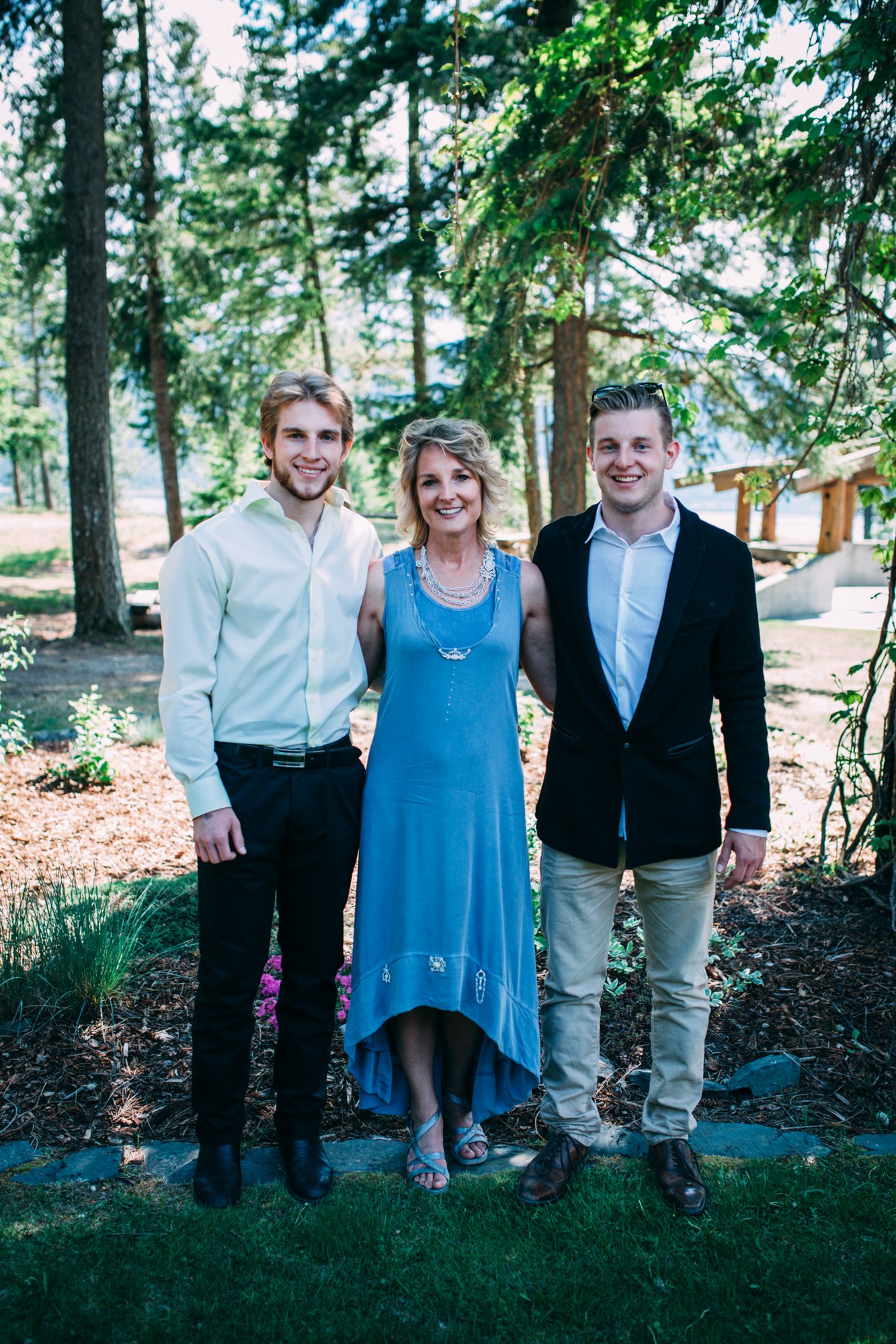 Mel & Eric: A family portrait beneath the trees.