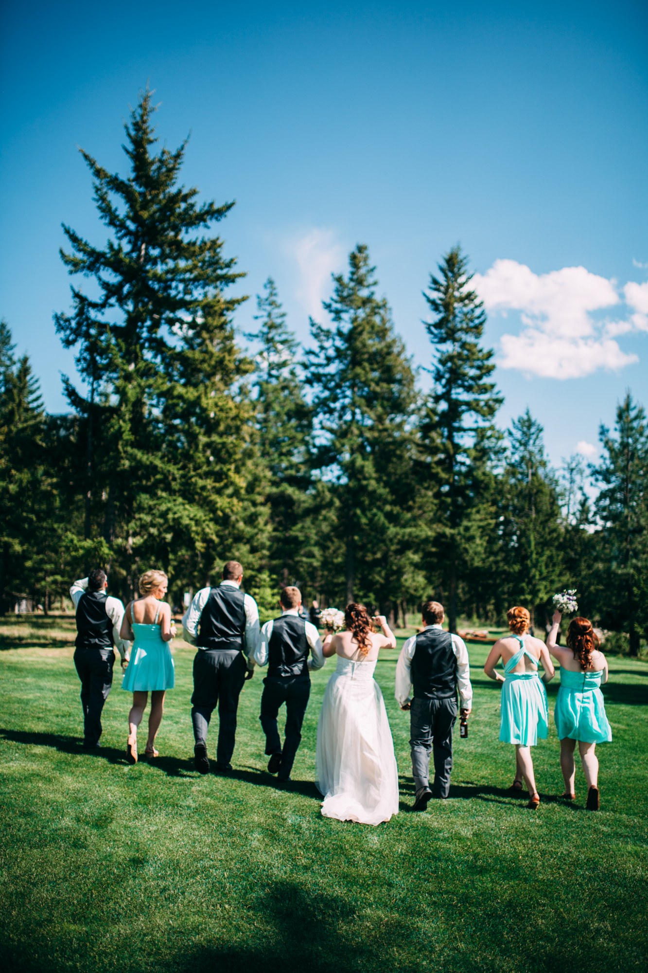 Mel & Eric: The wedding party walking together.