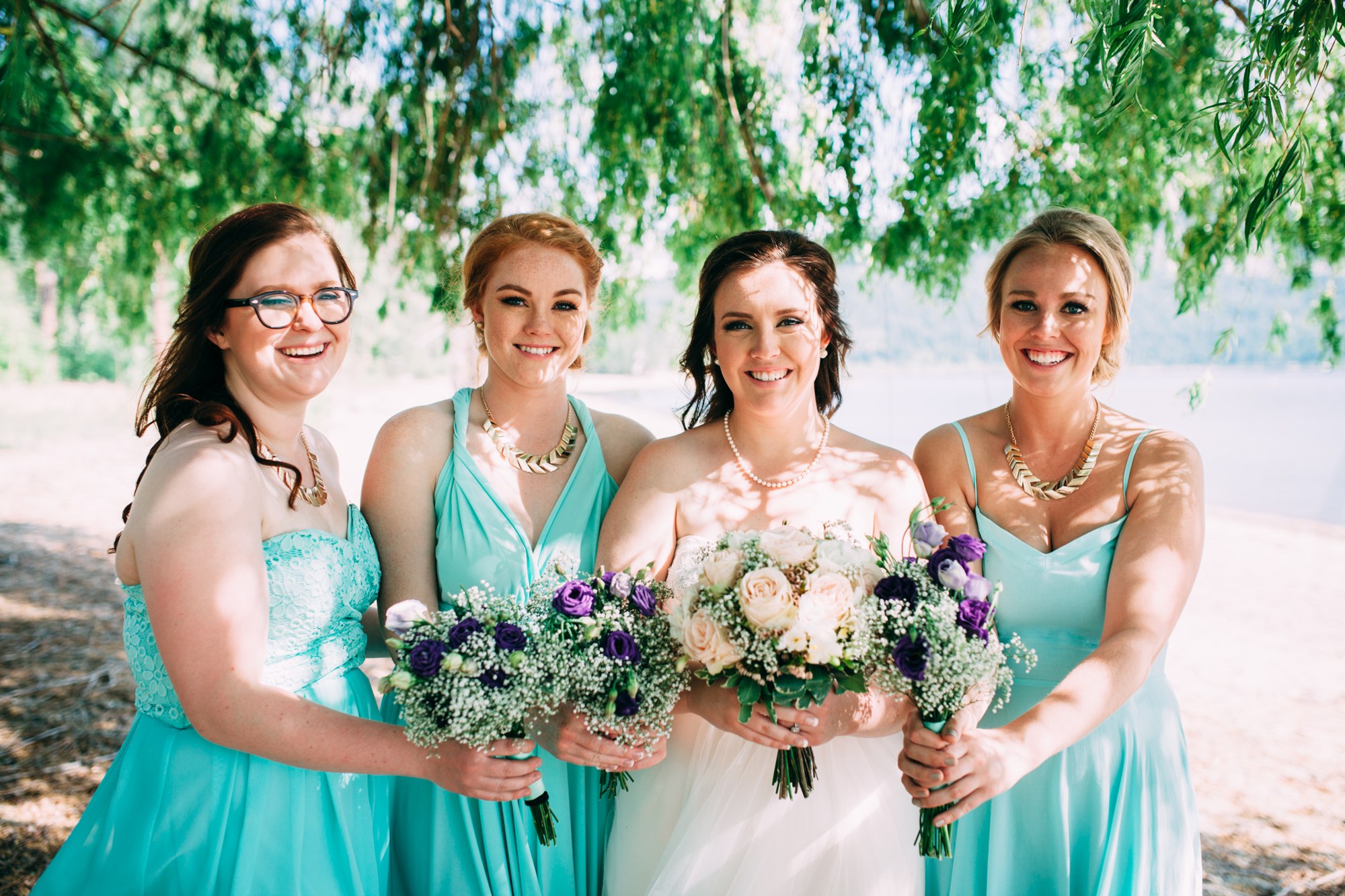 Mel & Eric: The bride and bridesmaids beneath the willow.