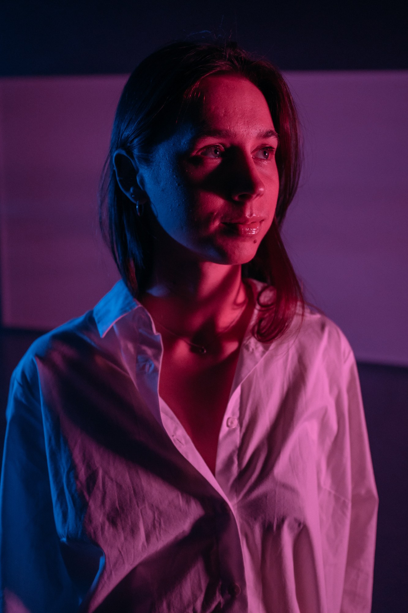 Our Yoga Space Studio Portraits: Close profile in saturated coloured light.