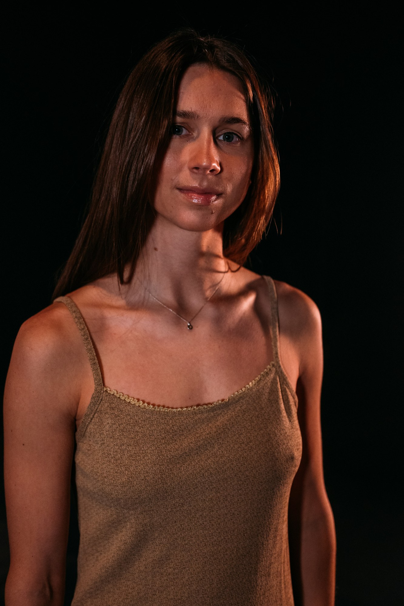 Our Yoga Space Studio Portraits: Quiet portrait against the dark studio.