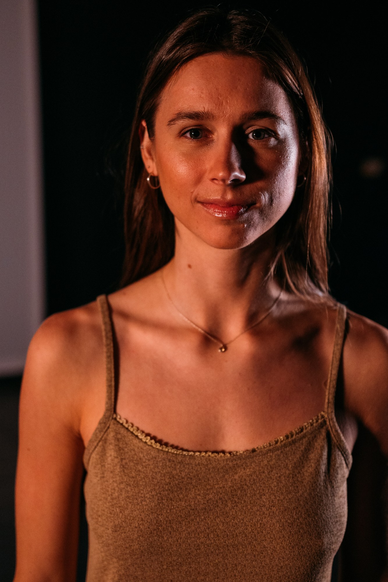 Our Yoga Space Studio Portraits: Calm close gaze in warm side light.
