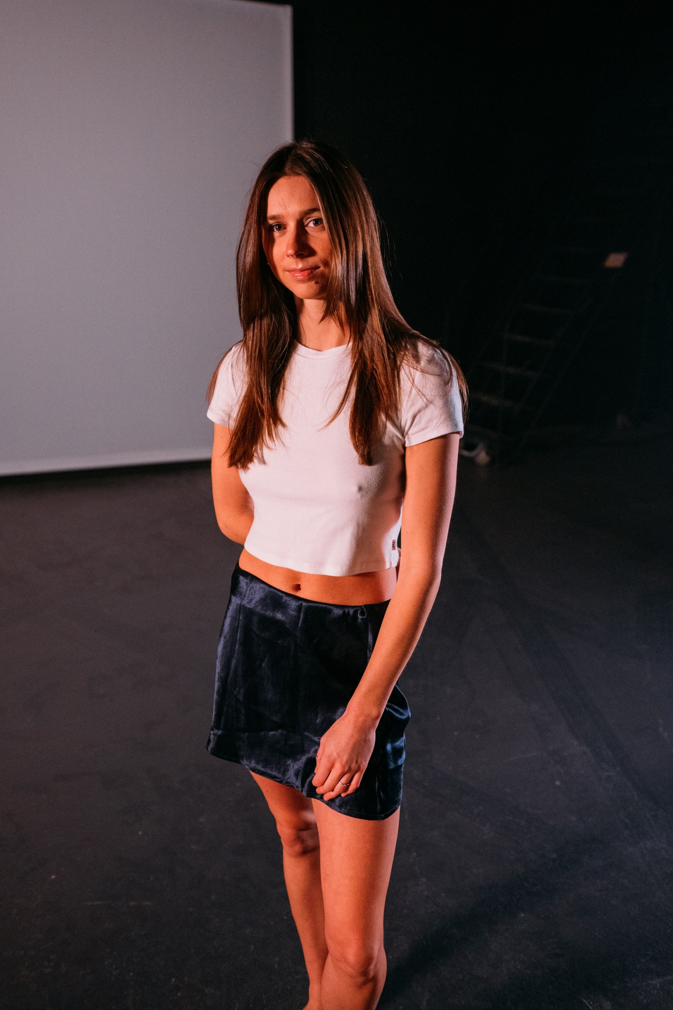 Our Yoga Space Studio Portraits: Full standing portrait in the tee and shorts.