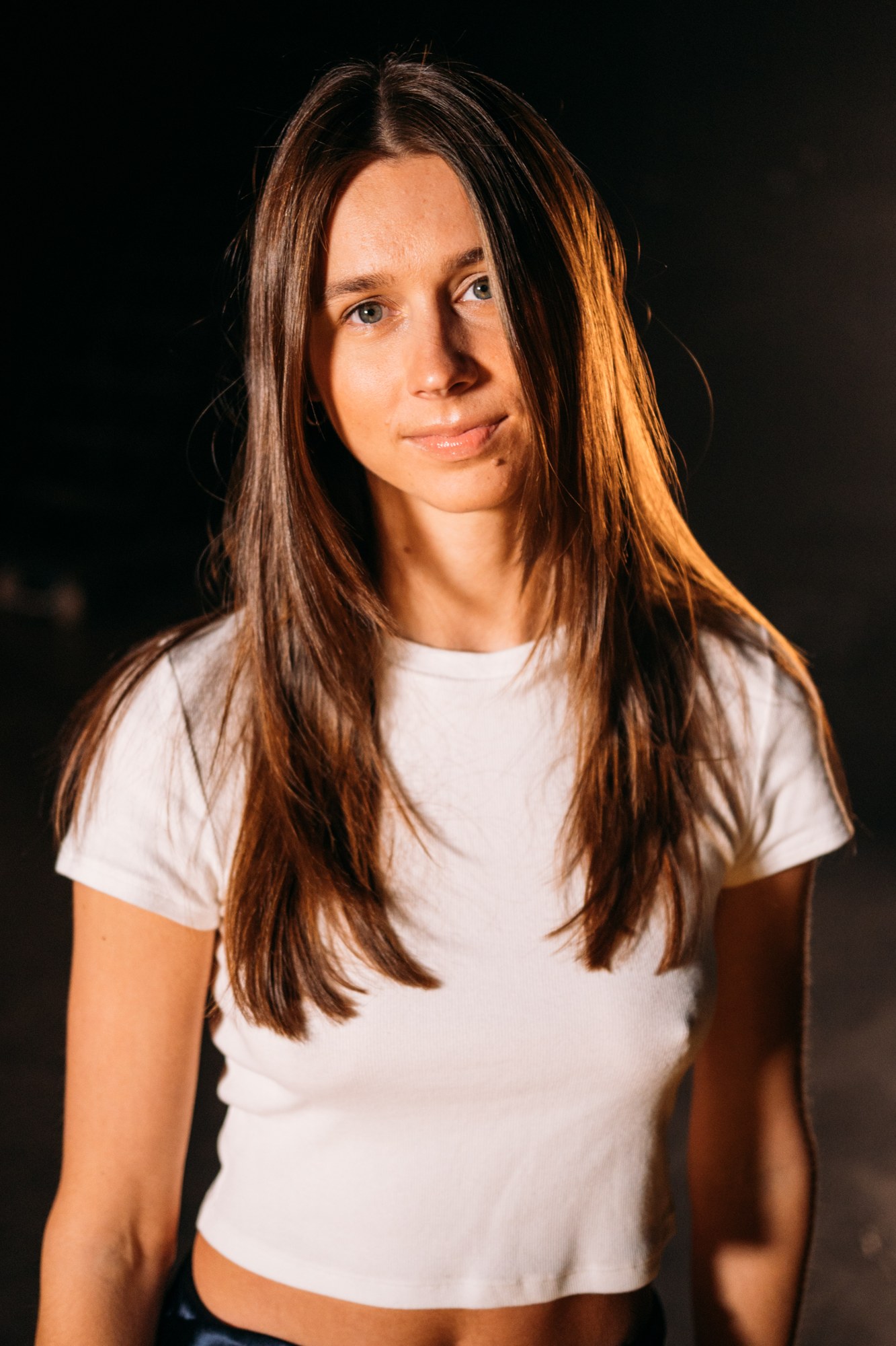 Our Yoga Space Studio Portraits: Thoughtful warm-light close portrait.