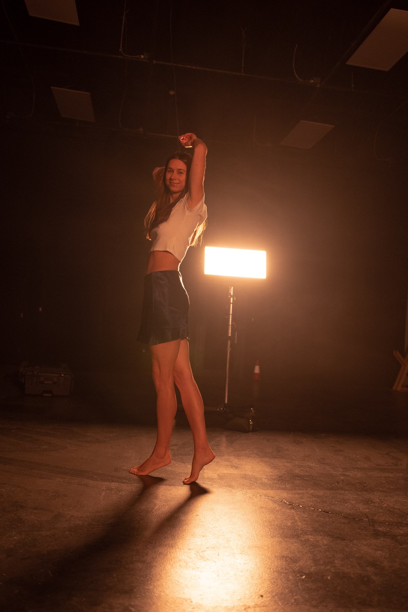 Our Yoga Space Studio Portraits: Extended dance shape against the warm light.