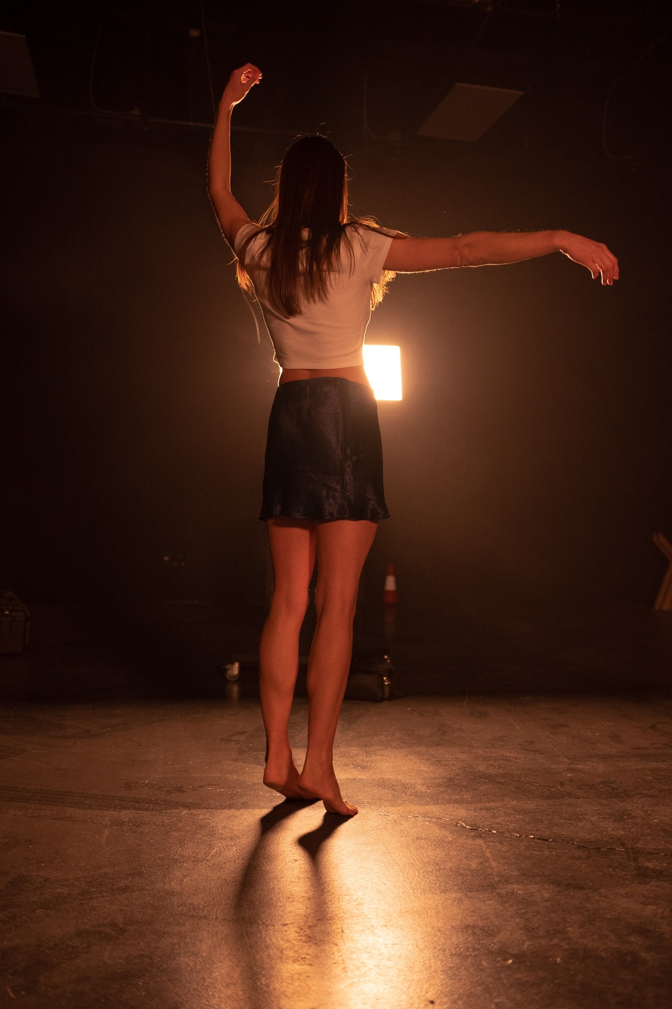Our Yoga Space Studio Portraits: Turning dance movement with open arms.