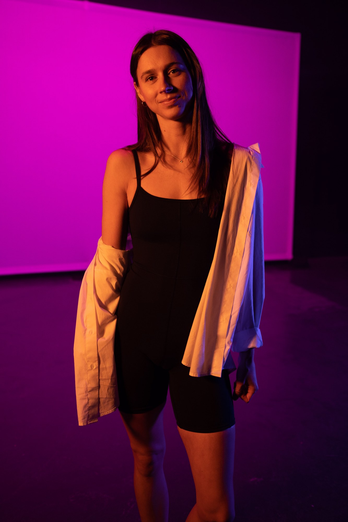 Our Yoga Space Studio Portraits: Full figure with the white shirt draped over black.