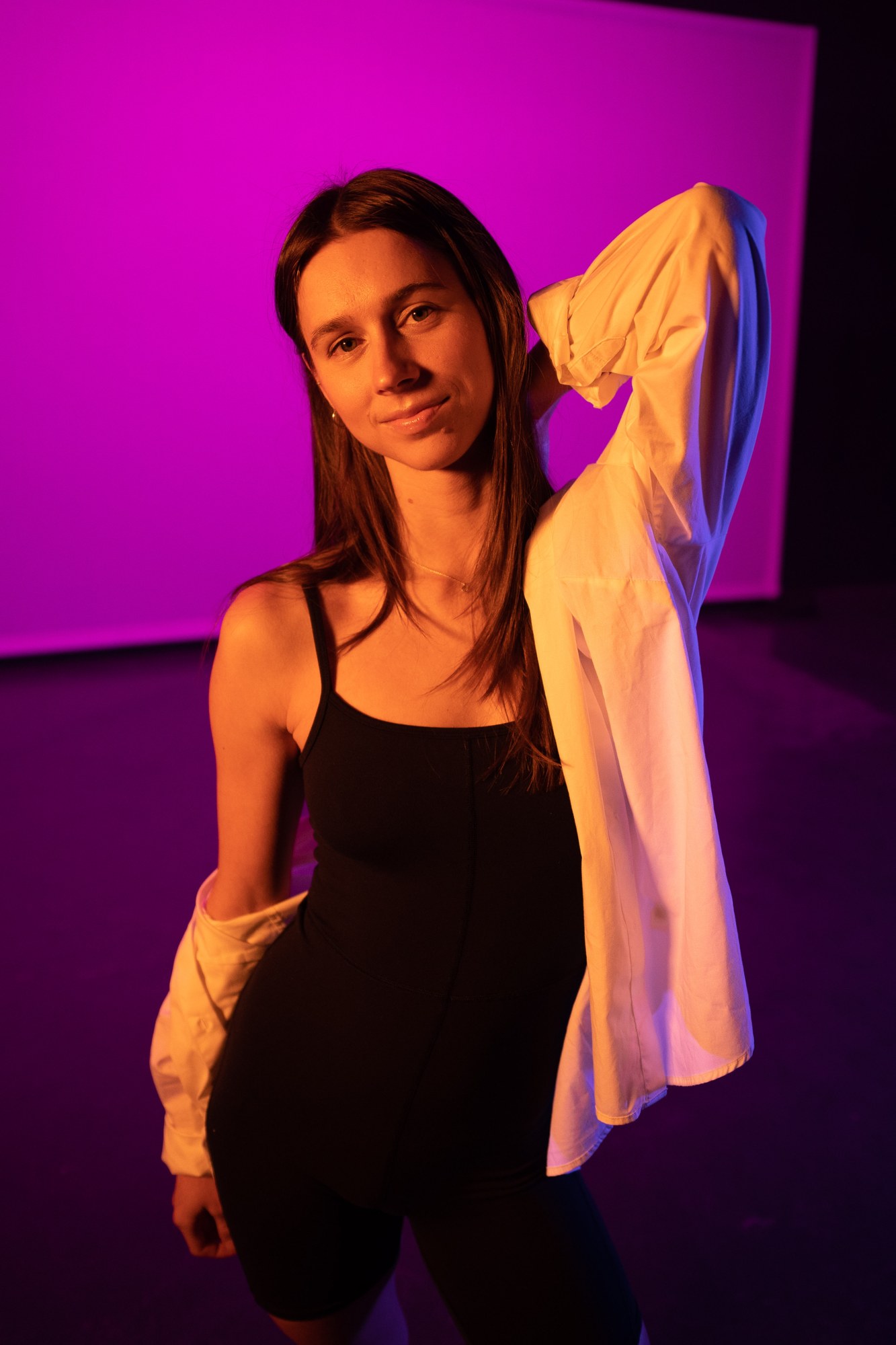 Our Yoga Space Studio Portraits: Raised-arm portrait in layered clothing.