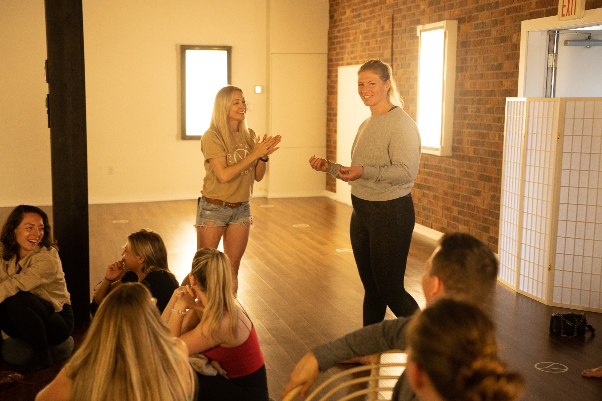 Our Yoga Space Turns Three: A smiling exchange during the draw.