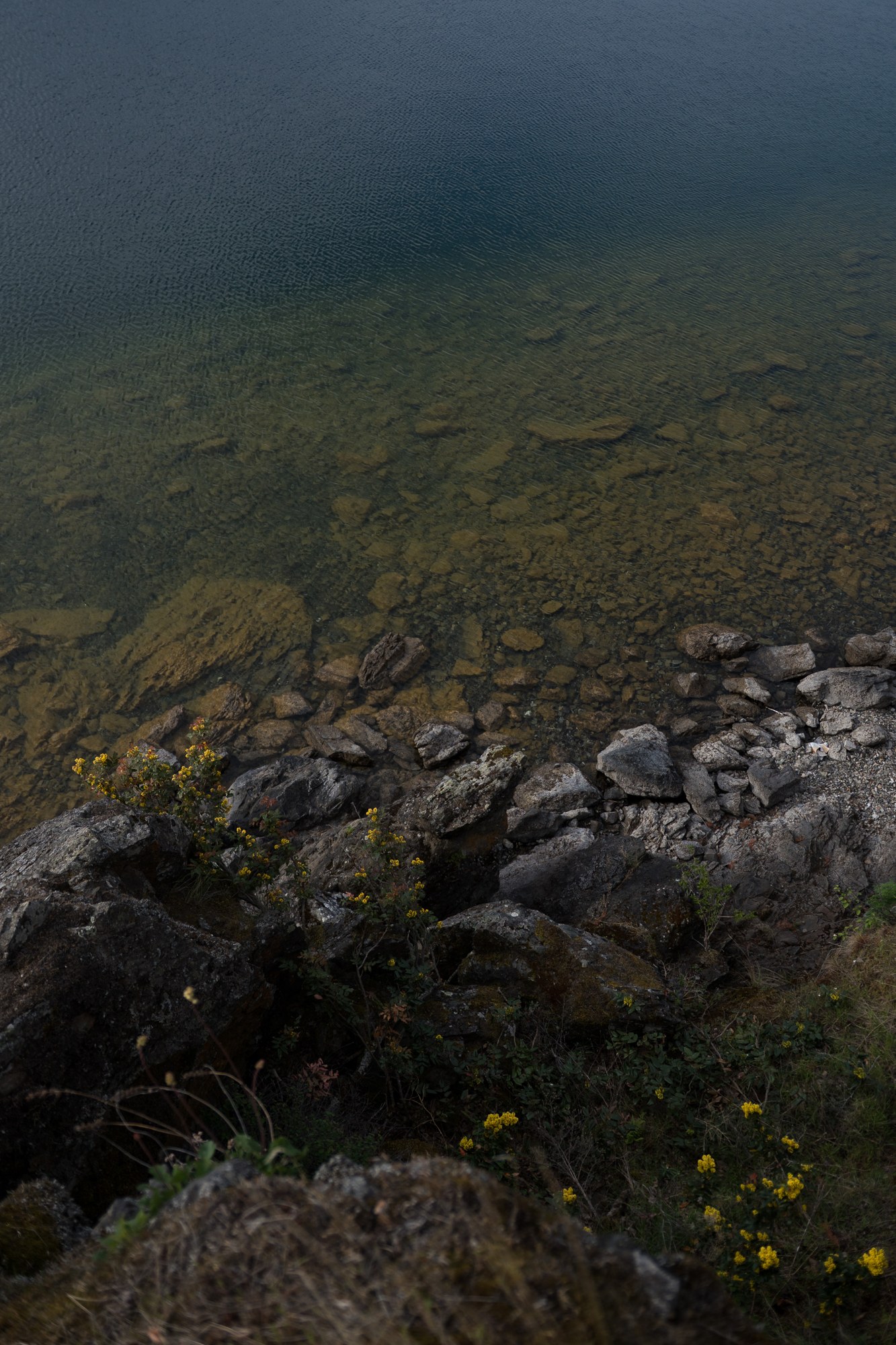 A Spring Walk to Paul’s Tomb: Shallows and the curve of the stony shoreline.